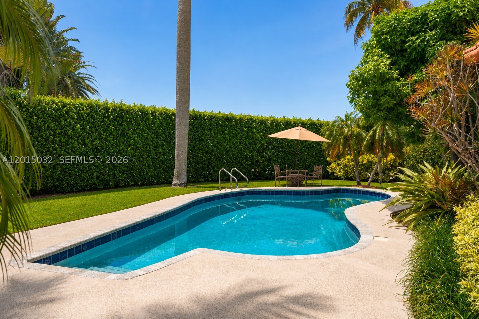 Located on prestigious South Hibiscus Drive, this exceptional corner-lot residence is one of Hibiscus Island’s most desirable non-waterfront opportunities. This meticulously maintained, move-in ready trophy home offers timeless elegance and charm, along with additional easement yard space that creates one of the most impressive non-waterfront lots across Palm and Hibiscus Islands. Surrounded by some of the most valuable real estate in all of Miami, the property offers a rare combination of privacy, scale, and location.

Designed for effortless living and entertaining, the home features five bedrooms, open-concept living spaces, and a flexible media room/office that can also serve as the fifth bedroom. The oversized pool is complemented by a remarkably private backyard with significant green space, lush landscaping, and fruit trees, creating a serene tropical setting rarely found on the islands.

A rare opportunity to secure a turnkey trophy residence at exceptional value within one of Miami Beach’s most prestigious gated communities.