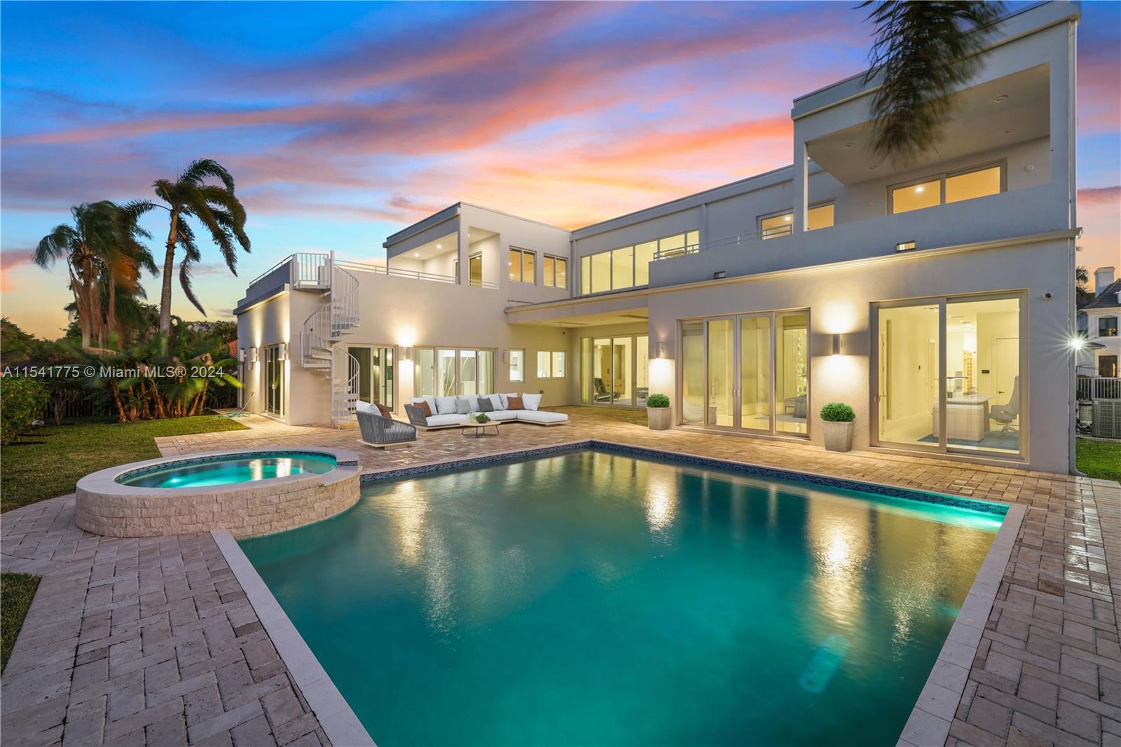 A magnificent, fully upgraded Villa Esther in the heart of Boca Grove Country Club with a luxurious, custom-made Home Theater. Built and designed in 2020. Each room meticulously detailed with high-gloss porcelain flooring, cascading lights, and artful fixtures. The gourmet kosher kitchen stands as the pinnacle of culinary excellence, featuring premium stainless steel appliances, a chef’s dream Dacor gas range, wall ovens, wine cooler, and a drawer-style microwave just to highlight a few features. 2 incredible owner suites. The upstairs owner suite has ample closet space, his and her vanities with a bath and steam shower. A spacious wrap-around balcony. Laundry upstairs and downstairs. Elevator in the home to facilitate access to both floors. Impact glass windows installed.