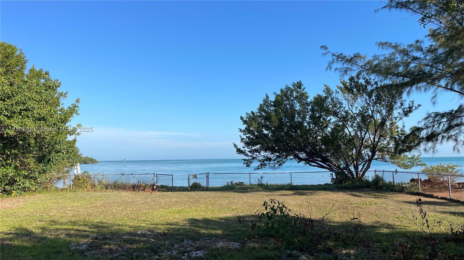 RARE 100' of waterfront re-development opportunity w/ DEEP WATER DOCKAGE APPROVED! 200' HIGHWAY FRONTAGE! Huge 74,890 SQ FT site with ACTIVE Conditional Use PERMIT for 10 unit & 4 affordable staff group home units. No TDR's required for pure commercial use! 6 TDR's available, plus more. MIXED USE ZONING - many commercial-residential possibilities, e.g.: up to 10 market rate units, higher density w/ affordable housing, or boutique HOTEL if you bring transient rights, etc. Includes a versatile 2 story raised CBS 6,128 SQ FT building, plus 2,340 SQ FT of outdoor porches. Near Vaca Cut for easy Ocean-Bay access, near airport, SHORT-TERM RENTALS! Contact Peter for info and tour of this amazing opportunity. THE KEYS LIFESTYLE - live, work, business, family compound - do it all right here!