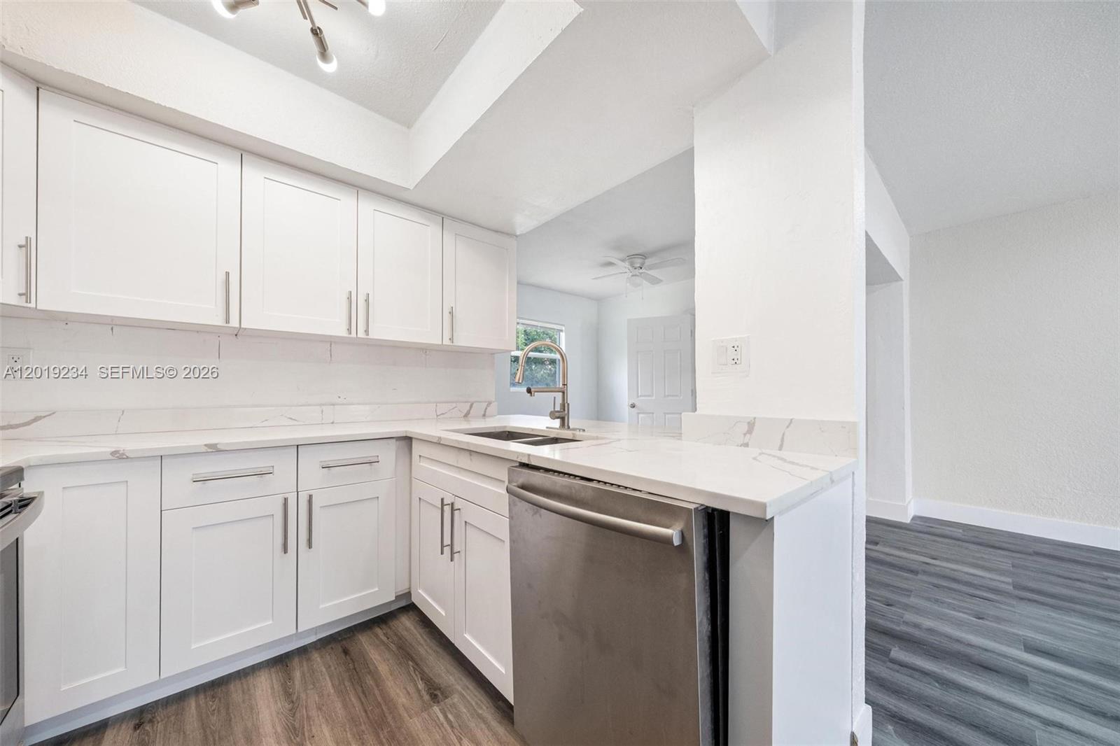 Discover this stunning 3-bedroom, 2-bath home in the heart of Lauderdale Lakes, featuring a beautiful updated kitchen with sleep granite countertops and modern appliances. Non-HOA community, this home offers both comfort and flexibility with no restrictive fee.