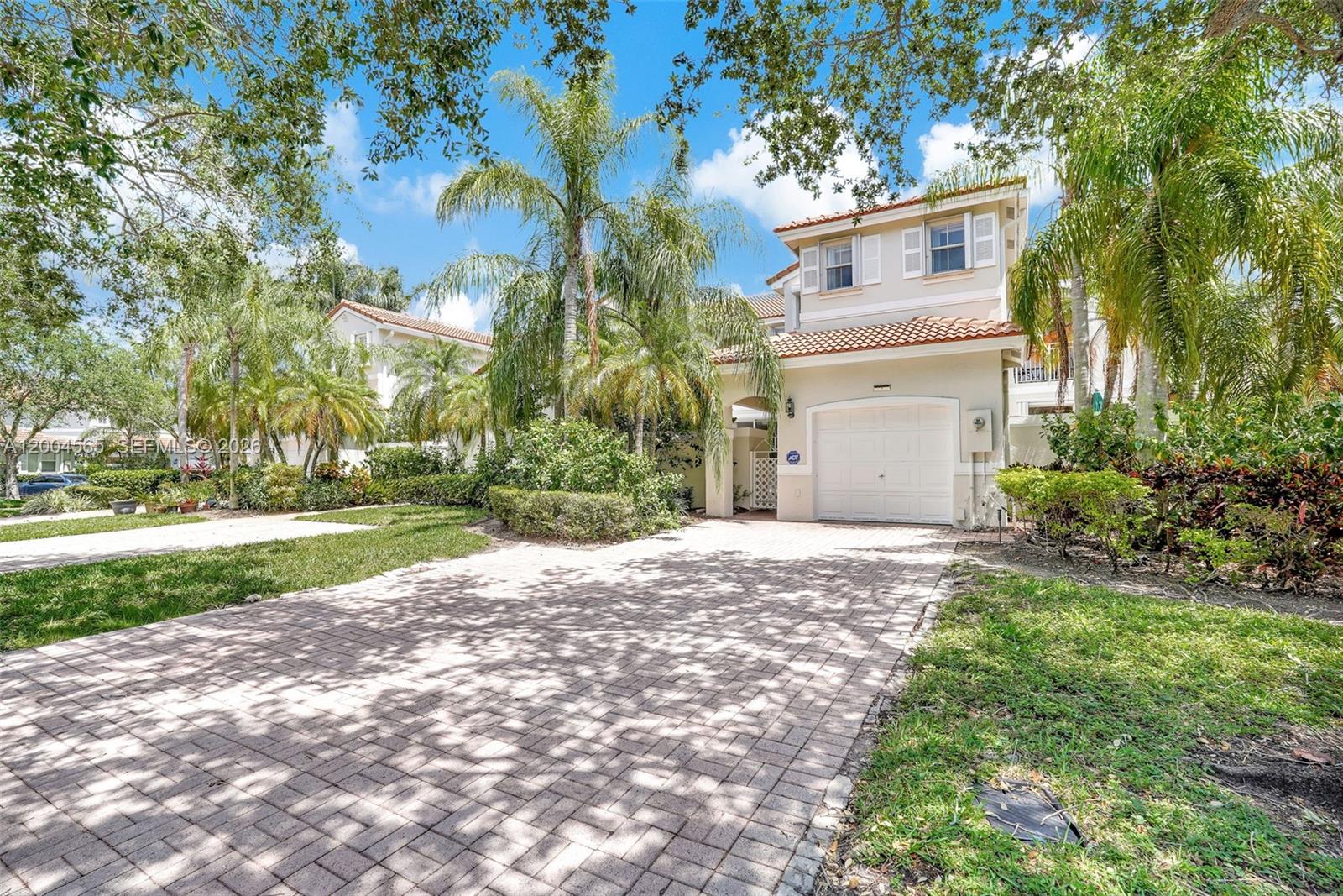 AMAZING 3BED 2.5 BATH IN WEST LAKE VILLAGE WITH 1 CAR GARAGE. STAINLESS STEEL APPLIANCES, LOVELY COURTYARD TO ENTERTAIN WITH ACCESS FROM KITCHEN AND LIVING ROOM AREAS. DRIVEWAY FITS 3 CARS. HUGE PRIMARY BEDROOM WITH WALK IN CLOSET, GUEST BEDROOM WITH PRIVATE BALCONY. CLOSE TO HOLLYWOOD BOARDWAK, BEACH AND FLL AIRPORT. 
GREAT AMMENITIES INCLUDING HEATED POOL, 2TENNIS COURT, GYM, CLUBHOUSE, BASKETBALL AND KIDS PLAY AREA.