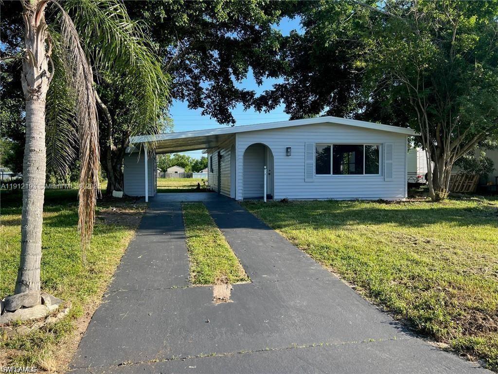 Discover this beautifully updated 2-bedroom, 2-bathroom concrete home in the heart of Old Lehigh Acres. Recently renovated with a new roof (2022), a brand-new air conditioning system, and modern appliances, this home is move-in ready and offers a blend of comfort and convenience. Situated on nearly a quarter acre with a small canal view, enjoy the peaceful surroundings and ample outdoor space. This property benefits from city utilities and is perfectly positioned near local shopping, public transportation, and just 18 miles from RSW International Airport. Ideal for both daily living and easy commuting, this charming home is a must-see!
