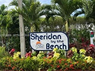 One of the best-located units in beautiful Sheridan by the Beach is now available!  This spacious 2nd floor unit overlooks the lushly landscaped grounds of the east courtyard and pool, and offers handsomely updated kitchen and baths, engineered hardwood floors in the living room and guest bedroom, and 28" diagonal tile floors throughout the rest of the residence. Stainless steel kitchen appliances are a plus in the fully remodeled kitchen. New central a/c (2025) provides year-round comfort and peace of mind.  The screened lanai, running the width of the unit, faces north, avoiding the heat of the tropical sun, provides ample space for casual seating, and features roll-down "soleil" shades which provide privacy as desired and protection from inclement weather.  The very spacious main bedroom features an en suite bath and lanai access.  Each bedroom has a walk-in closet with built-in shelving and storage.  The 2nd bathroom offers a luxurious and relaxing spa tub.  Sheridan by the Beach is adjacent to Broward County's West Lake Park, and is just about 2 miles to the Atlantic Ocean's golden beaches and the famed Hollywood Broadwalk, and perhaps 3 miles to Ft. Lauderdale International Airport and Port Everglades. Shopping, banks, dining and medical offices are all within walking distance as well.  What a great and convenient location!  Oh, and the condo maintenence fee INCLUDES state-of-the-art wireless television with hundreds of channels, HBO, hi-speed internet, and WiFi!