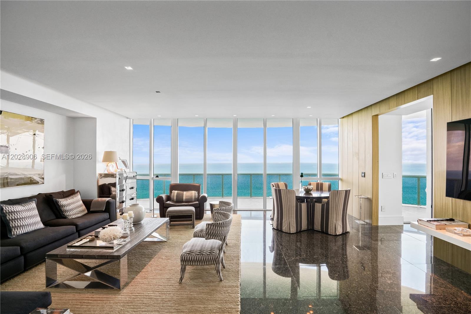 A meticulously fully renovated apartment featuring 3 bed, 3 bath plus a powder room in the prestigious Trump Tower III.
11-foot ceilings and floor-to-ceiling windows frame unobstructed views of the ocean, city, and Intracoastal Waterway from every room. The residence boasts a private elevator, custom-built walk-in closets, and a designer kitchen equipped with Bosch and Sub-Zero appliances, including a built-in coffee maker, along with marble flooring and automated window treatments.
Savor unforgettable moments from sunrise to sunset on the wraparound terrace.
Five-star amenities include private beach service, a private beachfront restaurant, spa, fitness center, swimming pool, concierge service, and valet parking.
A true coastal gem in Sunny Isles Beach.