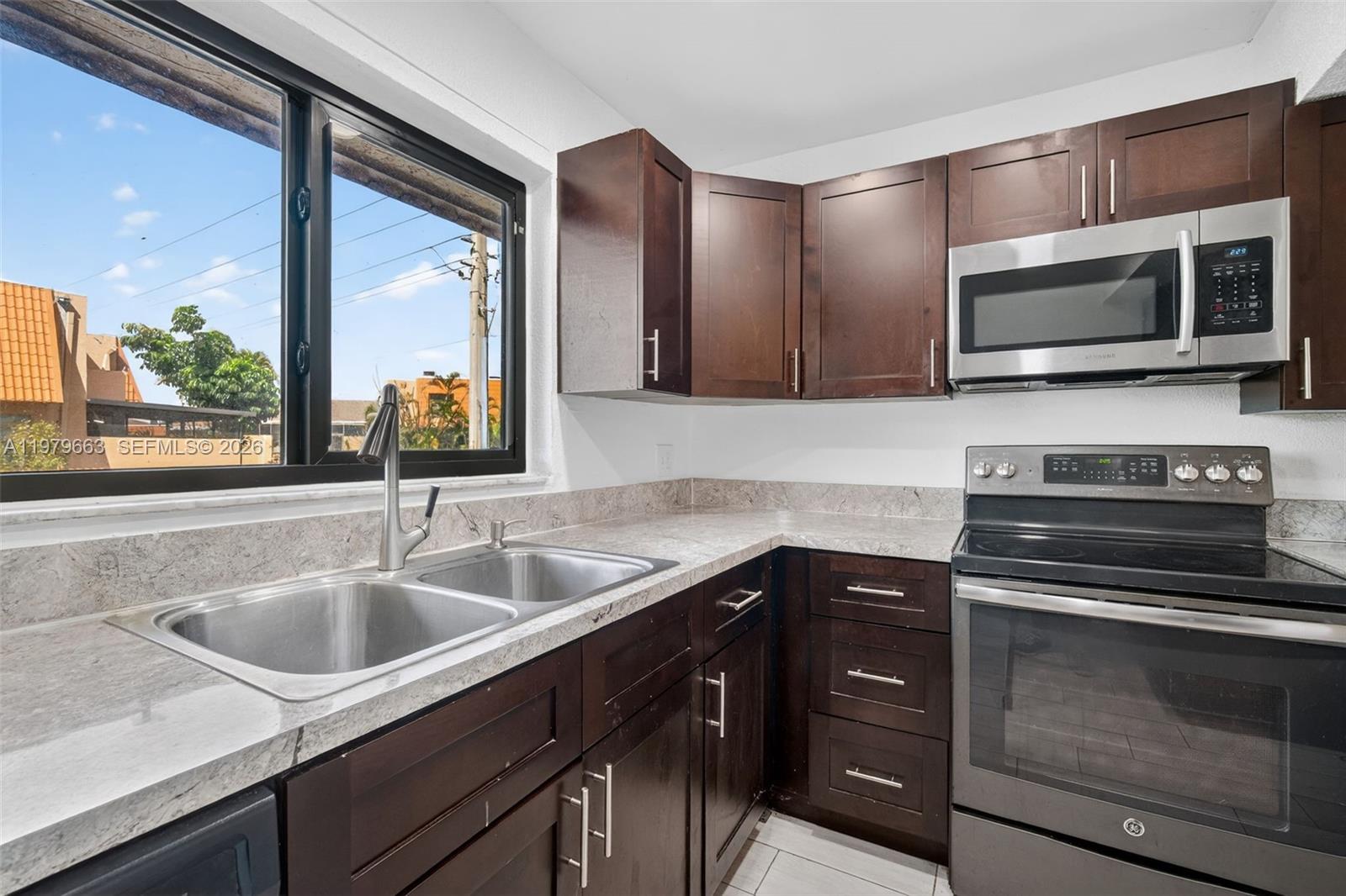 **PRICE REDUCED & SPECIAL SELLER INCENTIVE** – BUYER OPPORTUNITY!**
The value just got even better! The seller has reduced the price, making this one of the best opportunities in the area. Perfect for buyers seeking space, functionality, and exceptional value under $400,000.
**Special Incentive:** Seller will pay the monthly HOA dues for three (3) years with an acceptable offer, providing substantial savings to the buyer.

Rarely available corner-unit townhouse with beautiful lake views in the desirable Westview #3 community of Pembroke Pines! This spacious 4-bedroom, 3-bathroom home features an open, functional floor plan, with one bedroom and a full bathroom conveniently located on the first floor.

Recent updates include a **new roof (only 2 months old)**, elegant porcelain flooring, a modern kitchen with stainless steel appliances, and updated finishes throughout. Enjoy peaceful lake views from the screened patio, along with the convenience of additional outdoor storage. Enjoy the beautiful community pool and Tennis Courts. 

Ideally located near shopping, dining, parks, hospitals, and major highways. This home offers both comfort and convenience.
 
Association fees include: Basic TV & Internet, Maintenance of Common areas, Insurance & Reserves.

Don't miss this rare opportunity to own a 4-bedroom townhouse in Pembroke Pines at an exceptional value.

Vacant and easy to show. 
**Agents, please see Broker Remarks.**