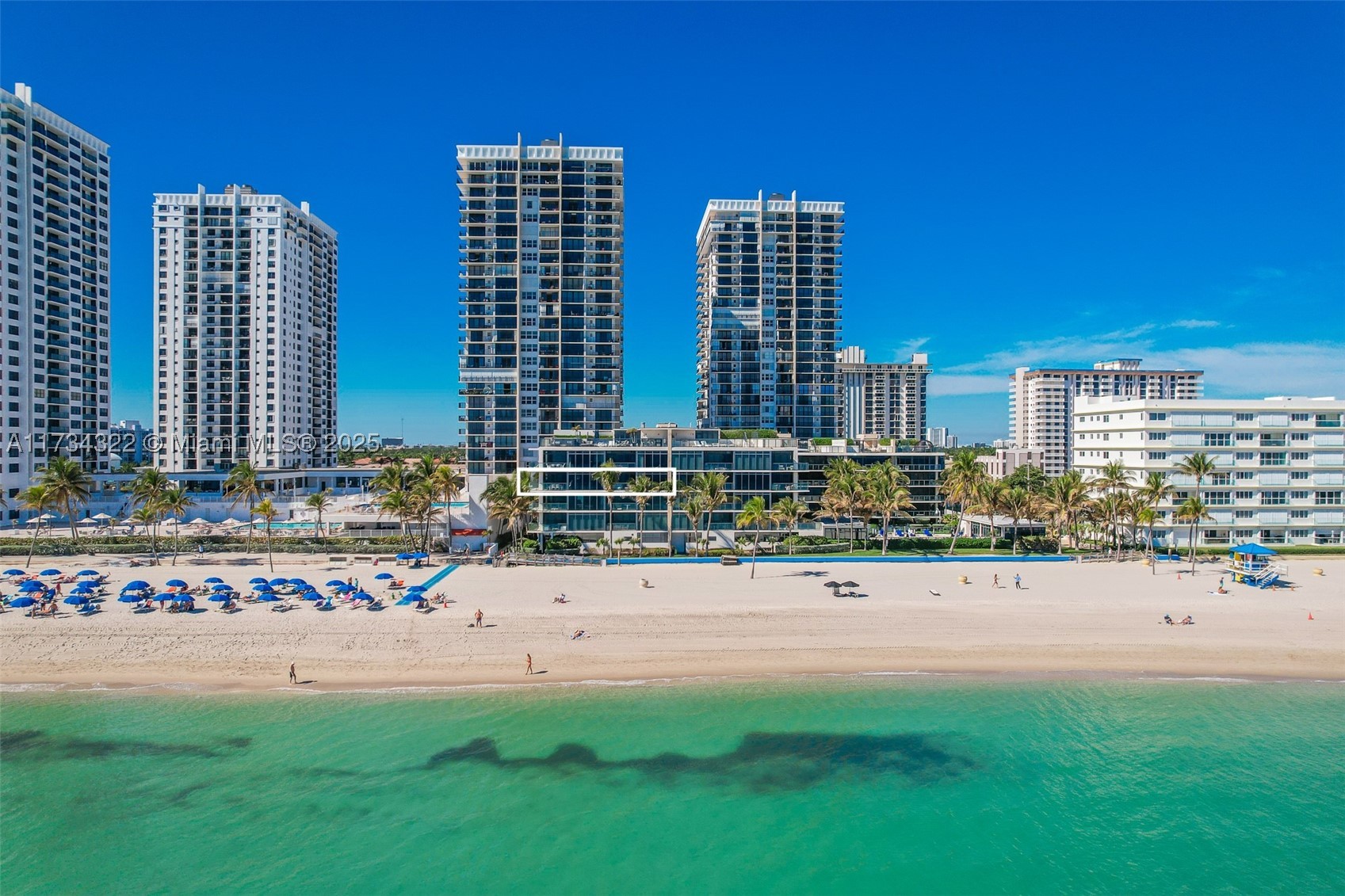 Discover beachfront luxury in this exclusive five-story boutique residence with direct beach access and panoramic ocean views. Designed by renowned Carlos Ott. With only two units per floor, a private elevator opens into your 2,606 sq. ft. retreat, featuring  three expansive balconies. This completely remodeled unit boasts premium flooring, custom ceilings, and elegant bathrooms. Fully furnished with exquisite taste, it offers three spacious bedrooms, each with an en-suite bathroom, plus a refined powder room. The gourmet kitchen features top-tier appliances, a wine fridge, and a gas cooktop with a built-in BBQ ideal for delightful dining. A large laundry room and same-floor storage add convenience. Located near top dining and entertainment, this residence offers refined coastal living.