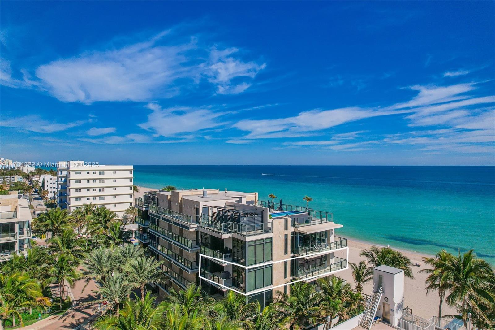 Discover beachfront luxury in this exclusive five-story boutique residence with direct beach access and panoramic ocean views. Designed by renowned Carlos Ott. With only two units per floor, a private elevator opens into your 2,606 sq. ft. retreat, featuring  three expansive balconies. This completely remodeled unit boasts premium flooring, custom ceilings, and elegant bathrooms. Fully furnished with exquisite taste, it offers three spacious bedrooms, each with an en-suite bathroom, plus a refined powder room. The gourmet kitchen features top-tier appliances, a wine fridge, and a gas cooktop with a built-in BBQ ideal for delightful dining. A large laundry room and same-floor storage add convenience. Located near top dining and entertainment, this residence offers refined coastal living.