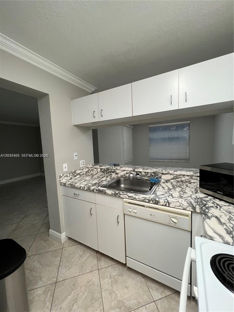 NAPOLI GARDENS AT CORAL S - Residential
