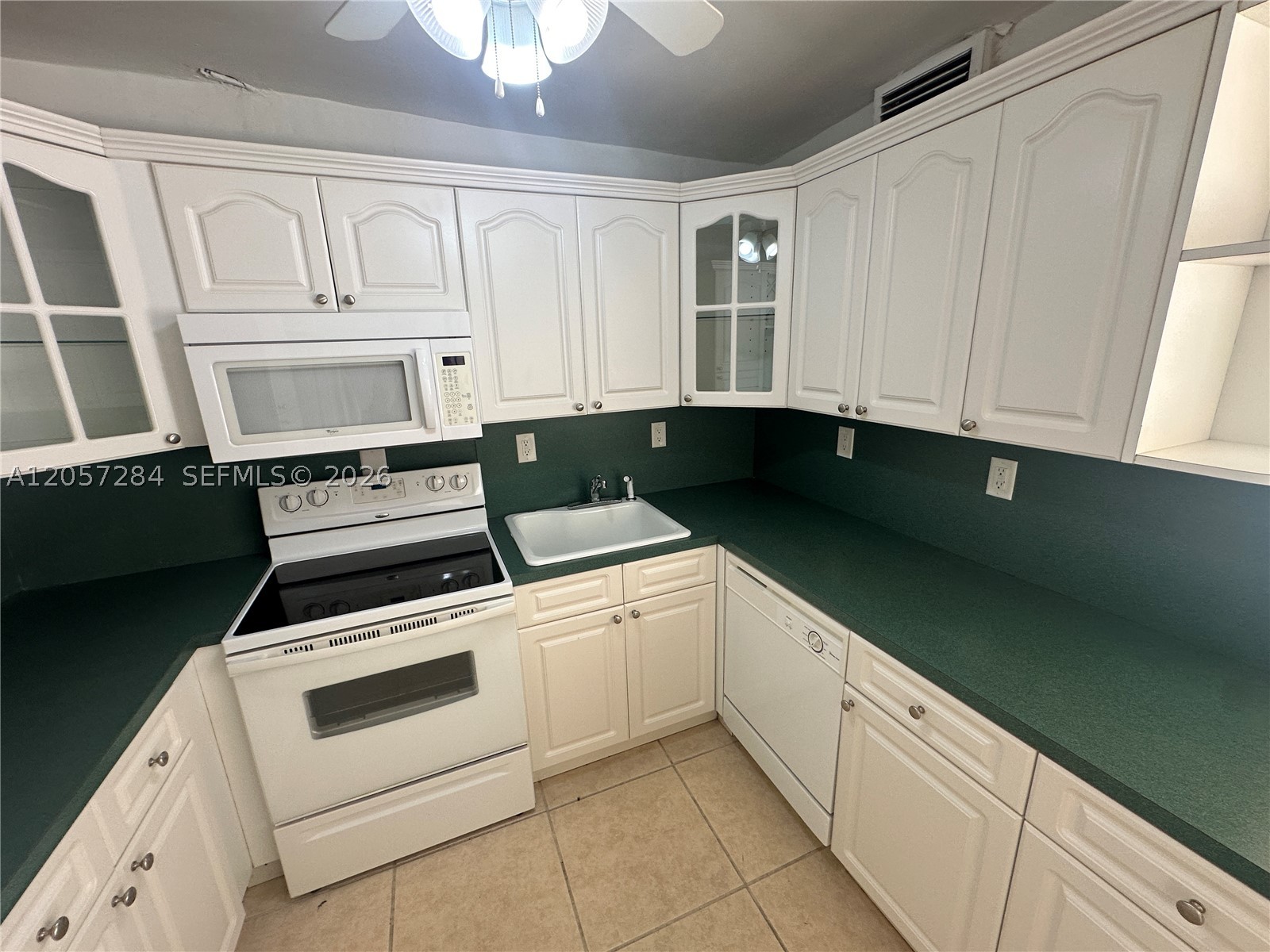 A well-laid-out unit featuring abundant natural light and spacious living areas. The building is currently undergoing its 40-year recertification and capital improvements, offering buyers the opportunity to purchase at a significant discount prior to completion. Ideal for cash buyers, investors, or owner-occupants seeking long-term value. Once renovations are complete, comparable property values are expected to reflect these upgrades. Conveniently located near major roadways, shops, and restaurants, and just minutes from Biscayne Blvd. A unique opportunity to secure a North Miami condo at a price well below replacement cost. Easy to show.