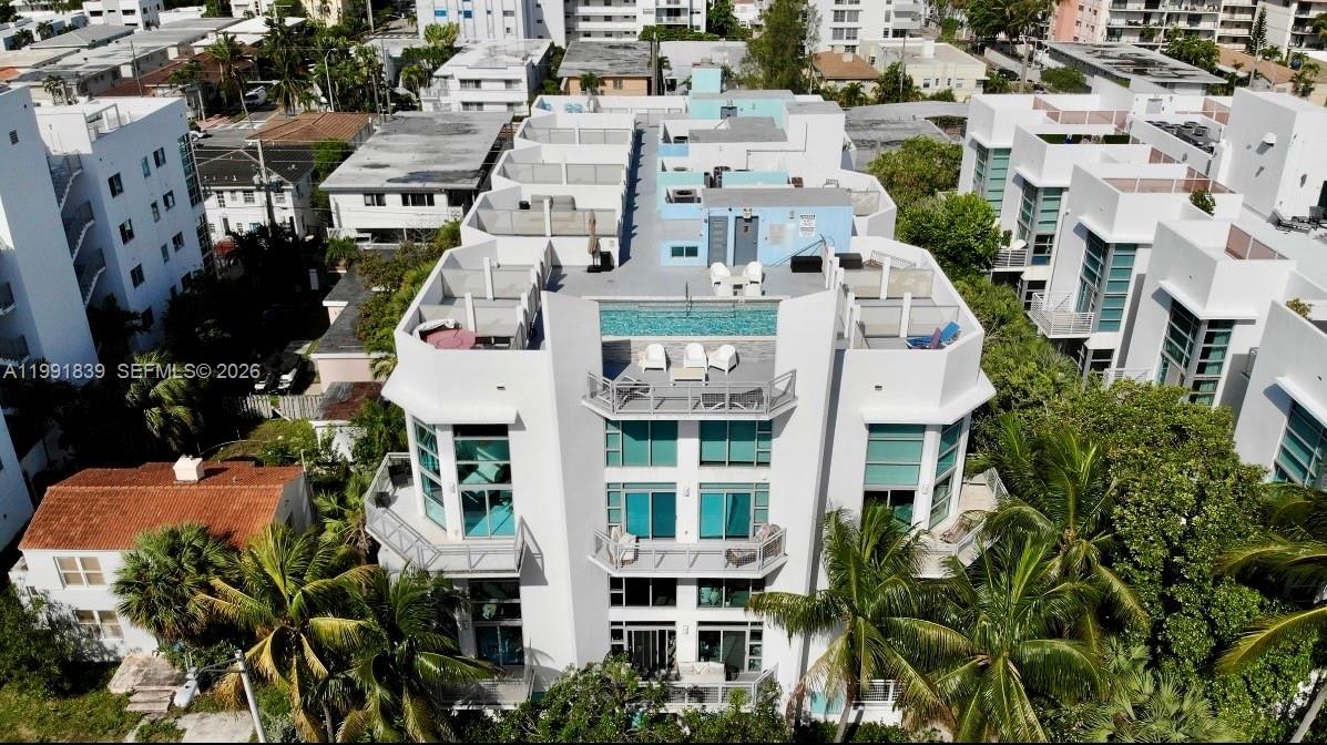 Rarely available two-story residence in the boutique Vilazul Seaside Condominium on Collins Avenue. This distinctive home showcases soaring 18-foot ceilings, floor-to-ceiling hurricane-impact windows, and elegant wood flooring, creating a bright and airy living experience.

The main level features an open-concept kitchen, a spacious living and dining area, and a private bedroom with a full bath—ideal for guests, a home office, or flexible living.  The principal bedroom and bath is located on the second level.

Enjoy exceptional outdoor living with access to a rooftop pool offering sweeping panoramic ocean views, along with your own private rooftop cabana. Positioned directly across from multimillion-dollar oceanfront estates, the residence benefits from protected sightlines and unobstructed vistas.

Ideally located just steps from Altos Del Mar Park and two blocks from North Shore Oceanside Park, you’ll also have immediate access to the scenic beachfront boardwalk—perfect for biking or walking north to Bal Harbour or all the way down to South Beach, South Pointe Park.

Additional features include two assigned parking spaces and permitted storage, ideal for beach gear, luggage, and more.

Conveniently located just 2 min from Surfside, 5 min to Bal Harbour Shops, and 15 min to South Bch, this residence offers a rare opportunity to own in an exclusive, low-density boutique building w only 20 units! 

Schedule your private showing today.