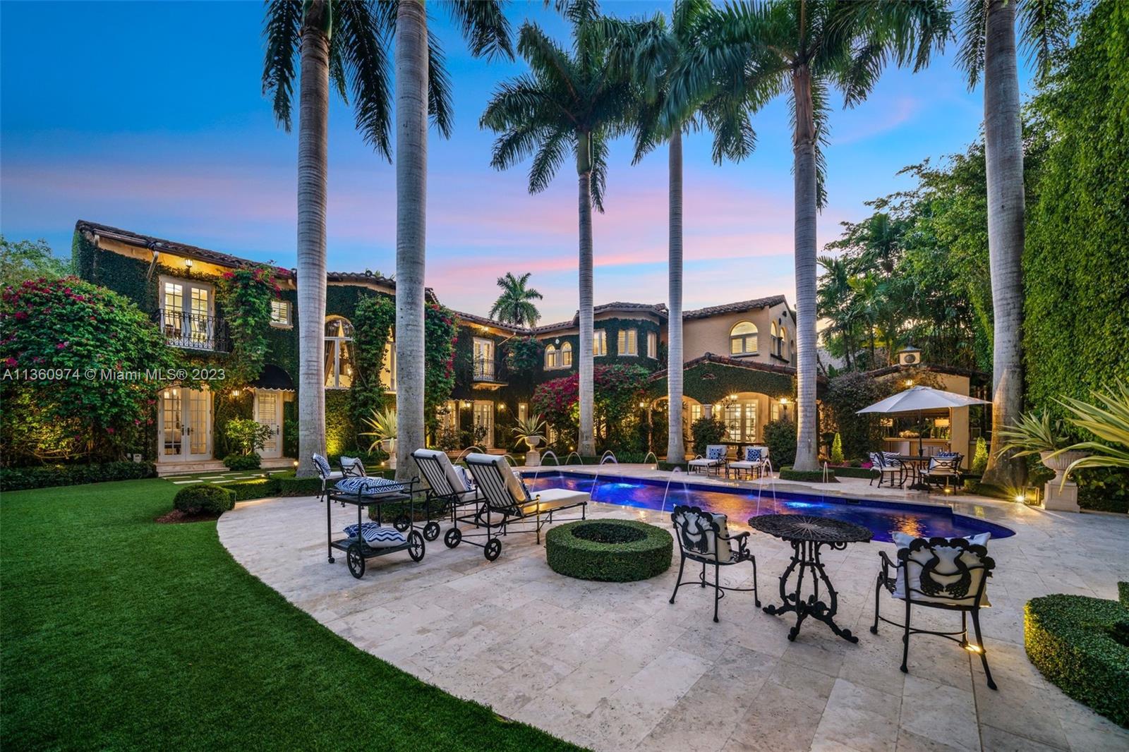 Palm Beach elegance meets historic Coral Way! With impressive architecture this walled & gated 5 BR/5.5 BA home sits on 18,020 SF lot surrounded by a 30’ privacy hedge. This residence was effectively rebuilt in 2000, bringing it to 6,690 SF designed for entertaining. Enter via a foyer overlooking a courtyard & water fountain. A formal living rm w/impressive fireplace & wood-beamed ceilings sits adjacent to a piano rm, the dining rm leads to the Clive Christian kitchen w/marble & butcher block island, & top-of-the-line appliances. The family rm & 2 BRs are on the 1st floor, as well as a covered outdoor liv area, summer kitchen, mosaic pool, & turf & tile patio. Via a sweeping staircase, the 2nd floor is home to dedicated study, 2 BRs & Bas, & primary suite w/ custom closets & spa-like bath.
