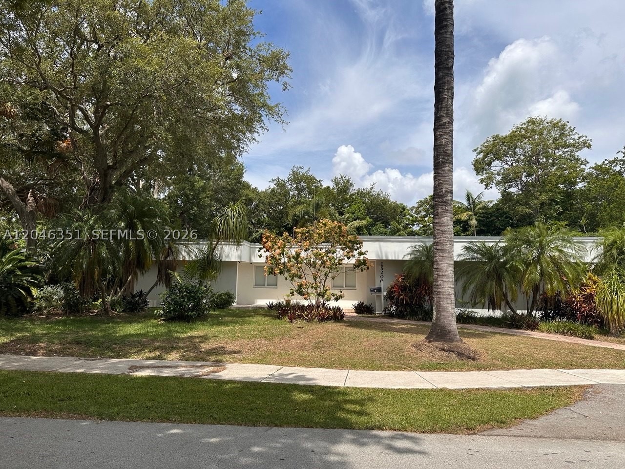 Beautifully updated 4-bedroom, 3-bath open-concept home ideally located near Coral Reef Park and top-rated schools. This spacious residence features two primary suites, both with direct access to the pool area, perfect for guests or multigenerational living. Upgrades include new A/C, updated PBC plumbing, new flooring, and a remodeled kitchen. Outdoor living shines with marble decking, screened pool enclosure, outdoor kitchen connections, and a gas-heated saltwater pool. Additional highlights include impact windows, generator hookup, surround sound in the primary suite, and an outdoor shower.