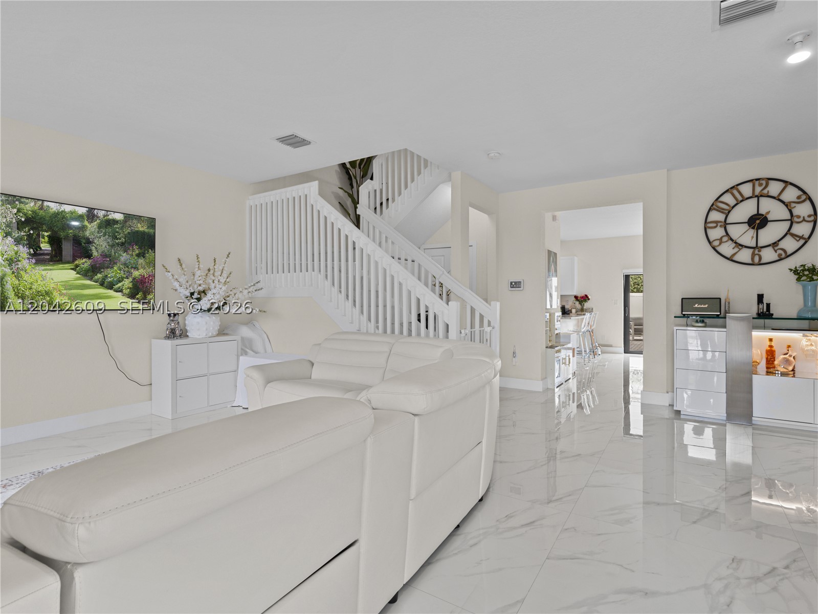 Beautifully maintained 3-bedroom, 2.5-bath townhouse located in the sought-after community of Aquabella. This move-in ready home features upgraded tile flooring throughout the entire property, including upstairs, downstairs, and the staircase, offering a clean and modern look. The bright white kitchen includes a spacious counter ideal for seating, perfect for everyday living and entertaining. Step outside to a private patio creating the perfect space for outdoor dining and relaxation. Aquabella offers excellent amenities, including multiple pools, a fully equipped gym, clubhouse, recreational areas, and beautifully maintained lakes with seating areas. The community is family-oriented and features 24-hour security with on-site guard service. A perfect combination of comfort, style, and lifestyle. (Pergola, chandelier, shed not included in rental. Washer/Dryer will be replaced)