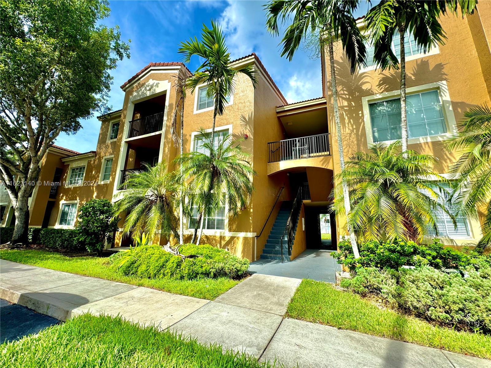 Beautifully First Floor Unit 2bed/2bath In The Charming San Andrews at Tamarac a Gated Community With Life Resort Style, Freshly Painted and the landlord will Change the Kitchen Range, Dishwasher, and Updated LED Lights, Next to a Tamarac Park a Perfect blend of Comfort, The Warm Atmosphere Instantly Welcomes You.  
A Beautiful Fountain Frames the Clubhouse W/ Amenities ...Pool, Jacuzzi, Gym, Playground, and Tennis Courts. 
The Apartment's Open Floor Plan Effortlessly Connects The Kitchen, Dining, and Living Area, Showcasing a Modern The Property Features Two Spacious Master Bedrooms...Don't miss out