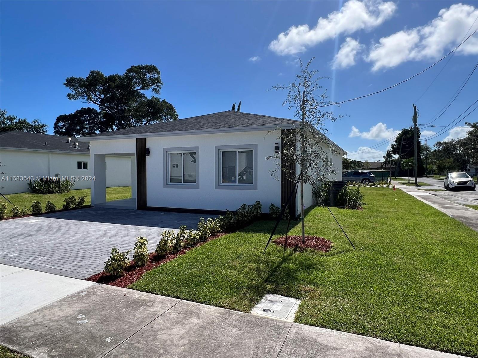 NEW CONSTRUCTION on a new Site Development of 5 Single Family Homes with no HOA. Quiet Street, Beautiful house with modern design, open kitchen concept and modern finishes. 1,560 Sqft. 3 bedrooms, 2 full baths, 1 Half Bath. Lot of 5,437 Sqft. Equipped with New stainless steel kitchen appliances, Quartz counter top, white kitchen cabinets made of pine wood, wall cabinets upgraded to 42'' height. Modern floors in glossy white big format venatto porcelain tile throughout the house, Impact windows, concrete pavers driveway. Fast growing new Neighborhood. Very close to Aventura Mall, Ft Lauderdale Airport, and the beach.