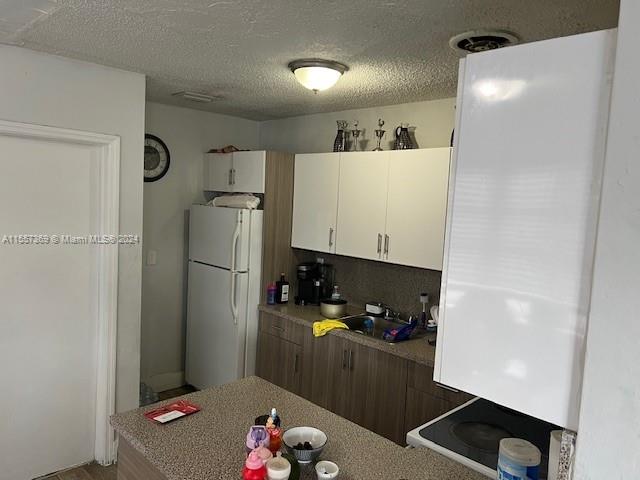 STUDIO ADDN TO TOWN OF HI - Residential Income