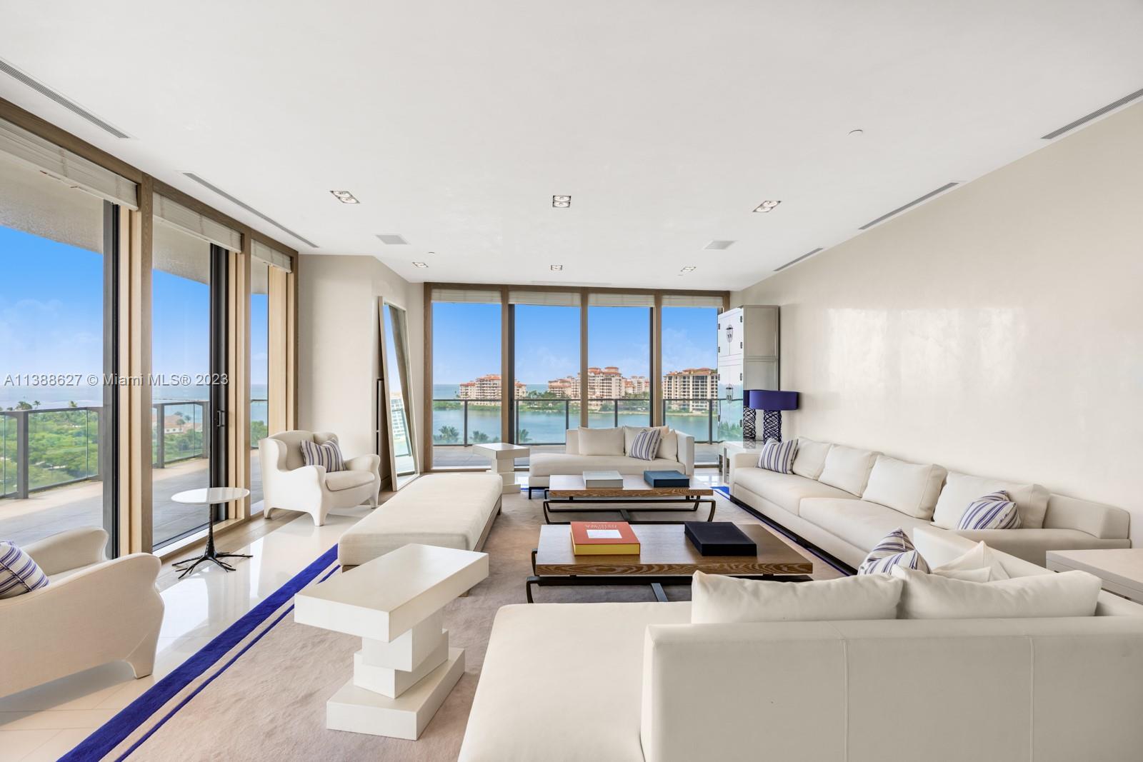 Designed by renowned Luis Bustamante, this turn-key residence at the exclusive Apogee features furniture & lighting fixtures by  Christian Liaigre, Promemoria, and Van der Stratten and offers an elevated living experience with views of the Ocean, Fisher Island, and city skyline. Upon entering, you'll be greeted by an open & airy floor plan that includes 4 BD/3.5 BA and an enclosed Media Room. The gourmet kitchen features top-of-the-line appliances and access to a gas grill on the terrace. Apogee offers world-class amenities, including a fitness center, pool, & 24-hour concierge, ensuring your comfort & security at all times. Located in the highly sought-after South of Fifth neighborhood, this residence is just steps away from some of Miami's finest dining destinations.