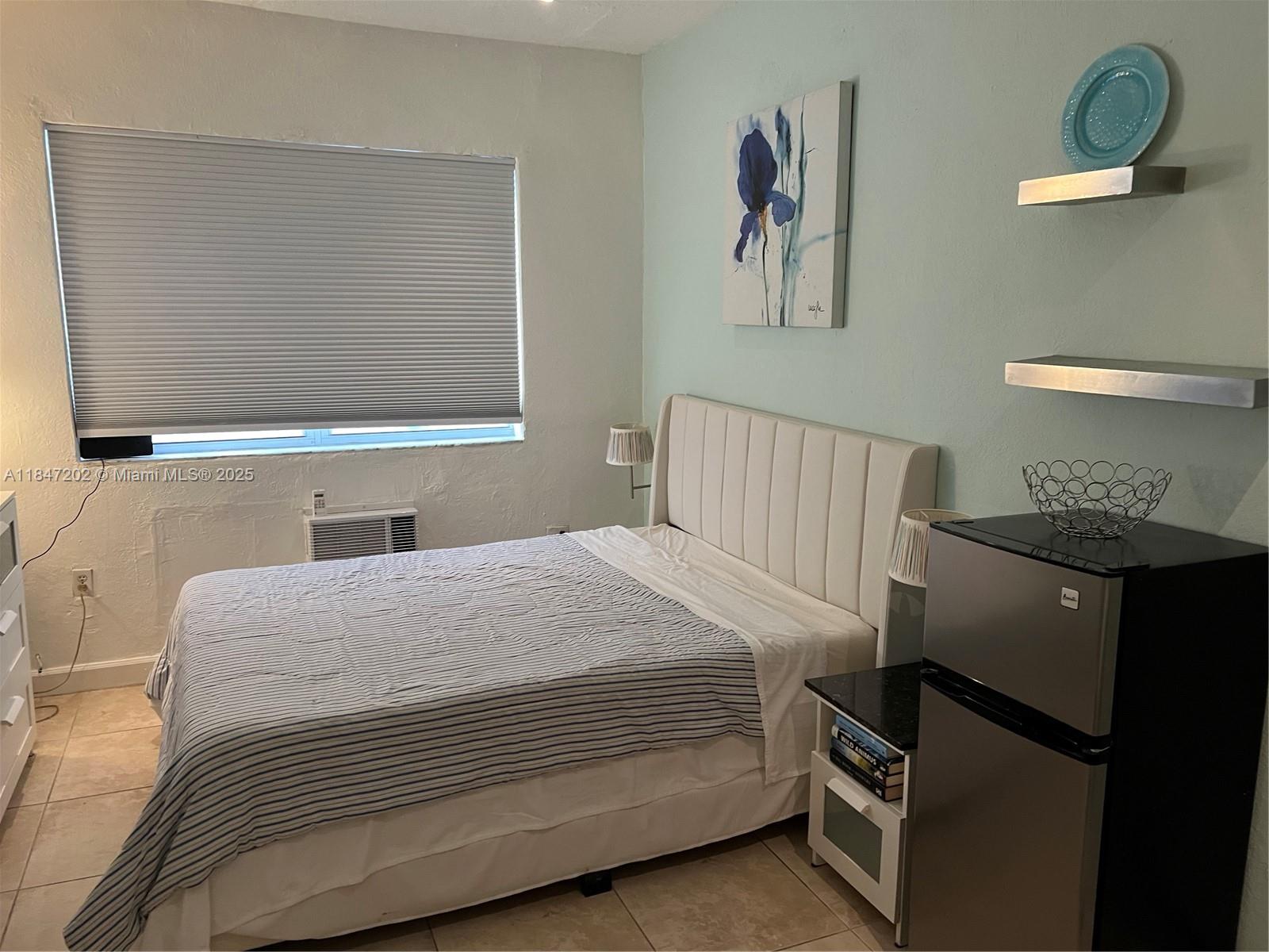 Prime investment opportunity in Miami Beach! This 1-bedroom, 2-bath unit has been cleverly divided into two separate studios 1-bath living spaces, each under a single folio. This unique setup offers maximum flexibility, perfect for generating dual rental income or providing a private guest suite. Situated just a short stroll from the beach, boardwalk, and iconic hotels like the Fontainebleau and Eden Roc, this property is a walker's paradise (Walk Score® of 90!). Enjoy an array of nearby dining options, shopping at Collins Avenue, and easy access to local parks. The building's desirable location and the unit's versatile layout make this an exceptional find. Don't miss out on this opportunity in a vibrant, sought-after neighborhood!
