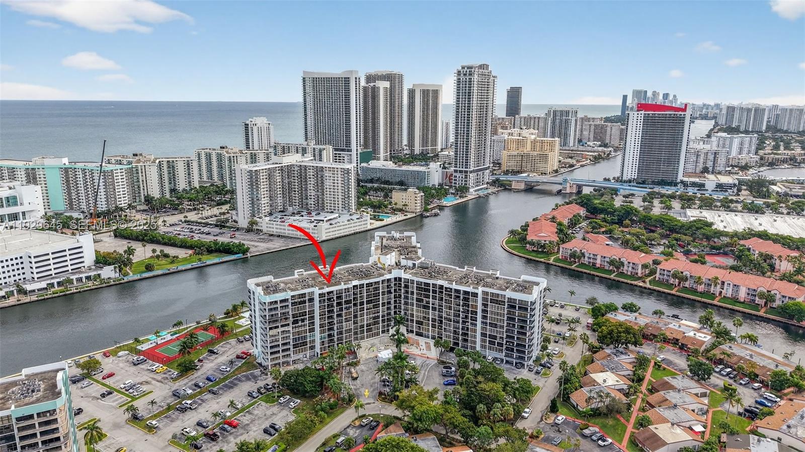 Bright & inviting 2-bedroom, 2-bathrooms condo on the 7th floor featuring an open balcony and abundant natural light with stunning west views of the Intracoastal Bay and city skyline. Floor-to-ceiling windows enhance the airy open layout. Offered completely furnished and turnkey, this home showcases porcelain flooring throughout and a remodeled, open-concept kitchen with granite countertops, light wood shaker cabinetry, and stainless-steel appliances—ideal for entertaining. The spacious primary suite boasts a large walk-in closet. Enjoy a resort-style lifestyle with amenities including an Intracoastal-front pool, 24-hour security, valet parking, fitness center, movie theater, billiards & ping-pong rooms, sauna & more. Outdoor amenities include tennis courts, pickleball, and a BBQ area.