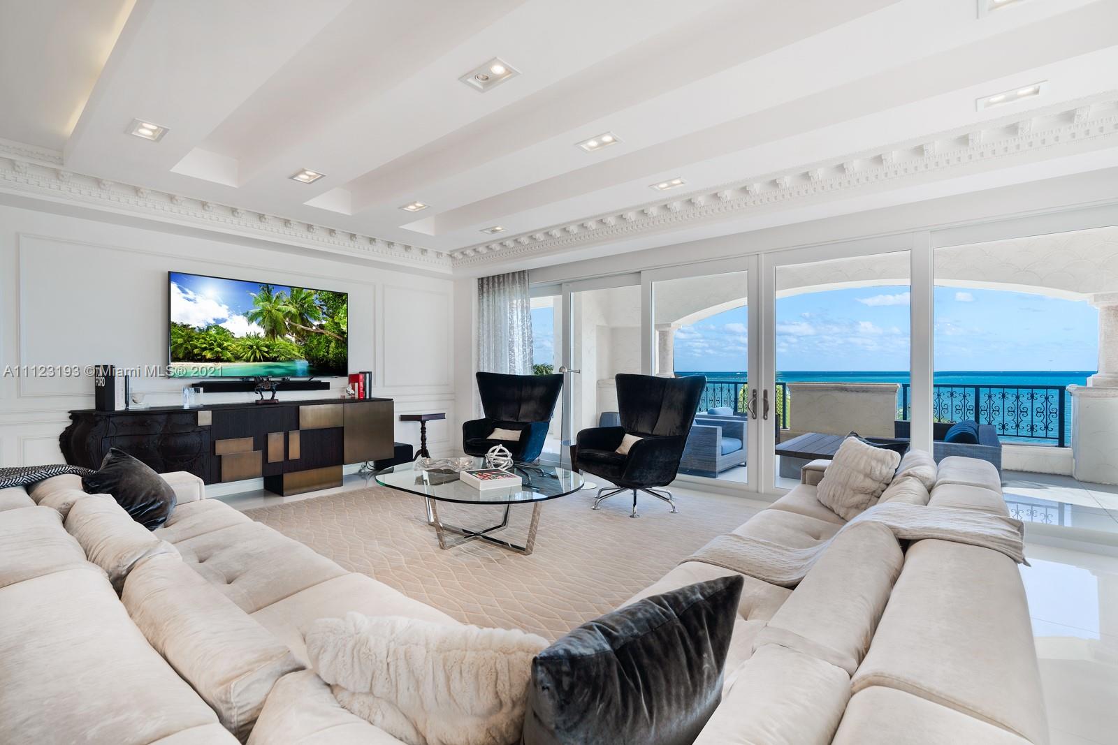 Spectacular Center Stack unit available on Fisher Island encompassing 3,310 soft with 3 bedrooms 3.5 bath. Enjoy unobstructed and Breathtaking direct ocean views from a large private terrace! The unit has unparalleled finishes designed by Steven G with white marble floors through out, custom Italian closets, a Custom Downsview kitchen and top of the line appliances. Large master en suite with serene views of the beautiful blue ocean, private den/office off of the kitchen with access to a ocean view terrace. All hurricane impact resistant windows and doors. The unit provides 2 parking spaces and 1 golf cart space. Enjoy the Fisher Island Life-style with 5 start amenities.