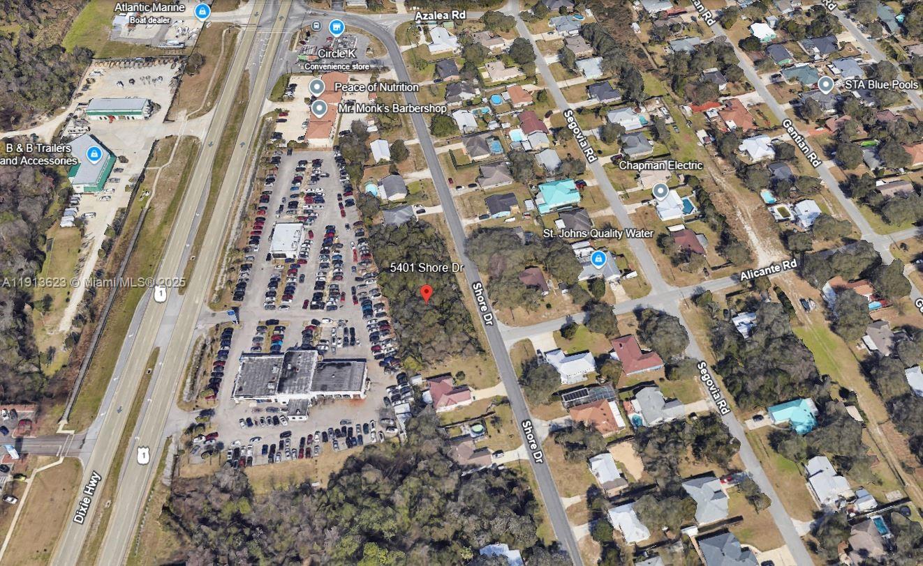 Don’t miss this exceptional opportunity to own a vacant residential lot in one of St. Augustine’s most desirable coastal neighborhoods. Located at 5401 Shore Drive, this oversized lot offers the perfect setting to build your custom dream home just minutes from the Intracoastal Waterway and Atlantic beaches. Nestled in a quiet, established community, the property offers a tranquil atmosphere with the convenience of being close to historic downtown St. Augustine, shopping, dining, parks, and top-rated schools. Whether you're planning a primary residence or a vacation getaway. The adjacent lot 5411 Shore Dr is also available, offering a rare chance to purchase side-by-side parcels. Keep both for added privacy, build a second home, or explore development potential.