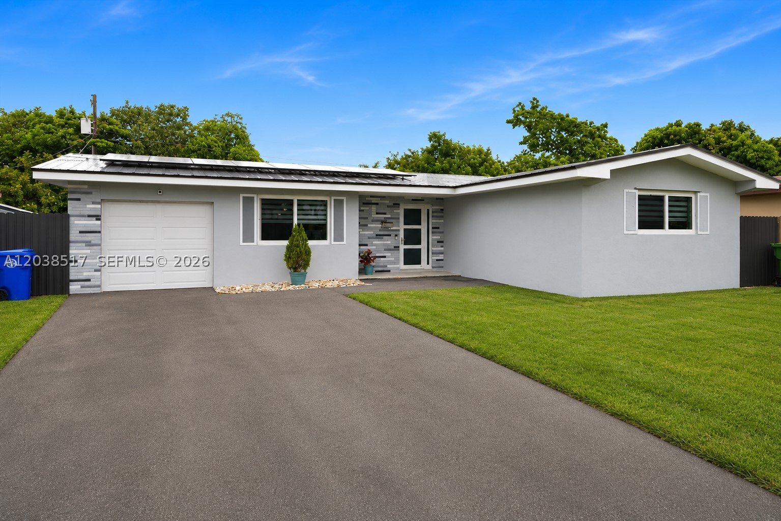 Over $100,000 in upgrades and solar-powered savings! This bright and spacious home delivers the perfect combination of modern improvements, energy efficiency, and low-maintenance living. Major updates include a metal roof, solar panels, full impact windows and doors, new electrical panel, PVC plumbing, and a Carrier 4.5-ton A/C system. The open layout is filled with natural light and offers generous living spaces ideal for today's lifestyle. Enjoy whole-house water filtration, reverse osmosis drinking water, insulated impact-rated garage door, extended driveway with ample parking for multiple vehicles, including space for an RV, boat, or work truck, storage shed, and a spacious backyard with room for a future pool. Move in with confidence knowing the costly upgrades have already been completed.