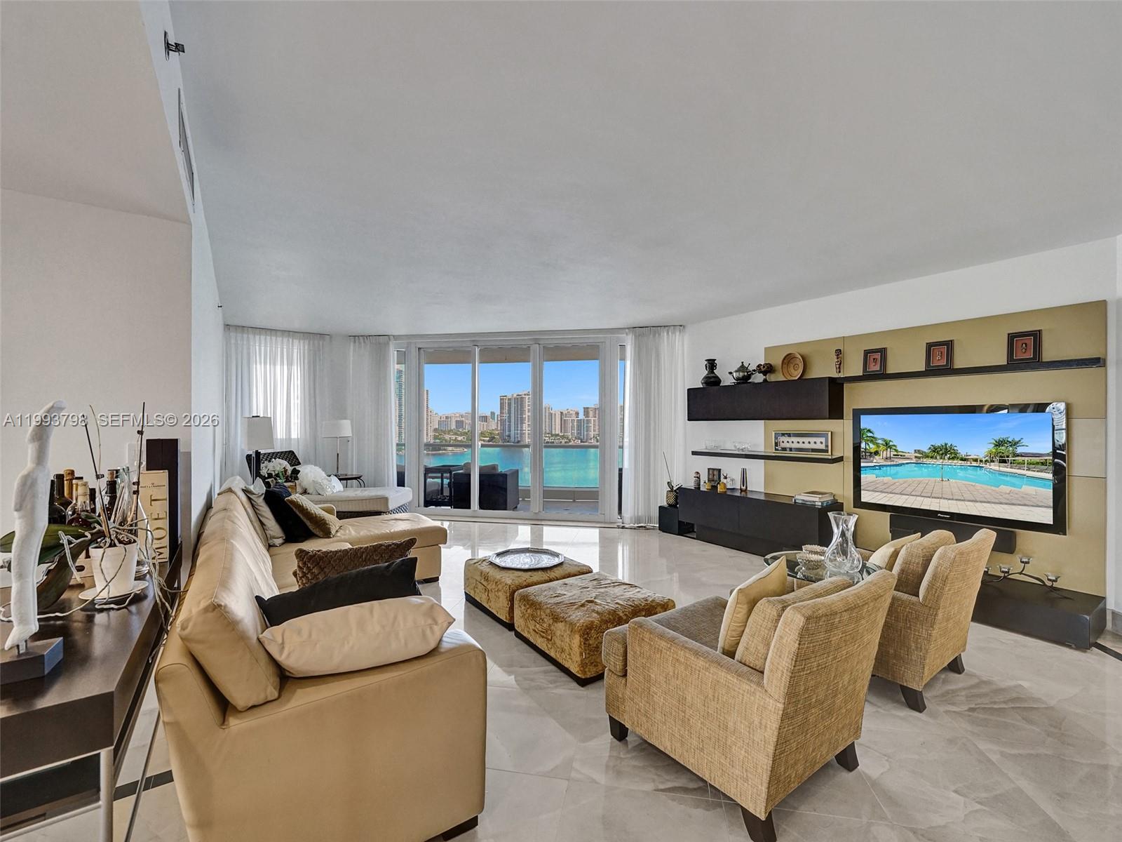 BEAUTIFUL 4 BED 4.5 BATH CORNER UNIT .... 4TH BEDROOM CAN BE USED AS MAIDS ROOM, STUDY, PLAYROOM. FABULOUS NE EXPOSURE WITH VIEWS OF THE OCEAN, INTRACOASTAL AND POOL DECK. MAGNIFICENT SUNSETS FROM 2ND & 3RD TERRACE..... REMODELED KITCHEN WITH SS APPLIANCES AND QUARTZ COUNTERTOPS....MARBLE FLOORS IN LIVING AREAS AND WOOD FLOORS IN BEDROOMS. ..... EXPANSIVE CUSTOM CLOSETS & SPLIT MASTER BEDROOM FLOOR PLAN.......NEW STATE OF THE ART POOL DECK....NEW HALLWAYS, NEW LOBBY, GYM AND COMMON AREAS..LIVE IN PRESTIGIOUS WILLIAMS ISLAND WITH FULL AMENITIES:  14 TENNIS COURTS, 4 PICKLE BALL COURTS, 2 PADEL COURTS, 3 RESTAURANTS, STATE OF THE ART SPA, MARINA, WALK/JOG PATH, KIDS PLAYGROUND, BASKETBALL COURT, SOCCER FIELD, PUTTING GREEN, COURTESY BUS, PLUS GOURMET SUNDRY COFFEE/GELATO SHOP, AND SO MUCH MORE....