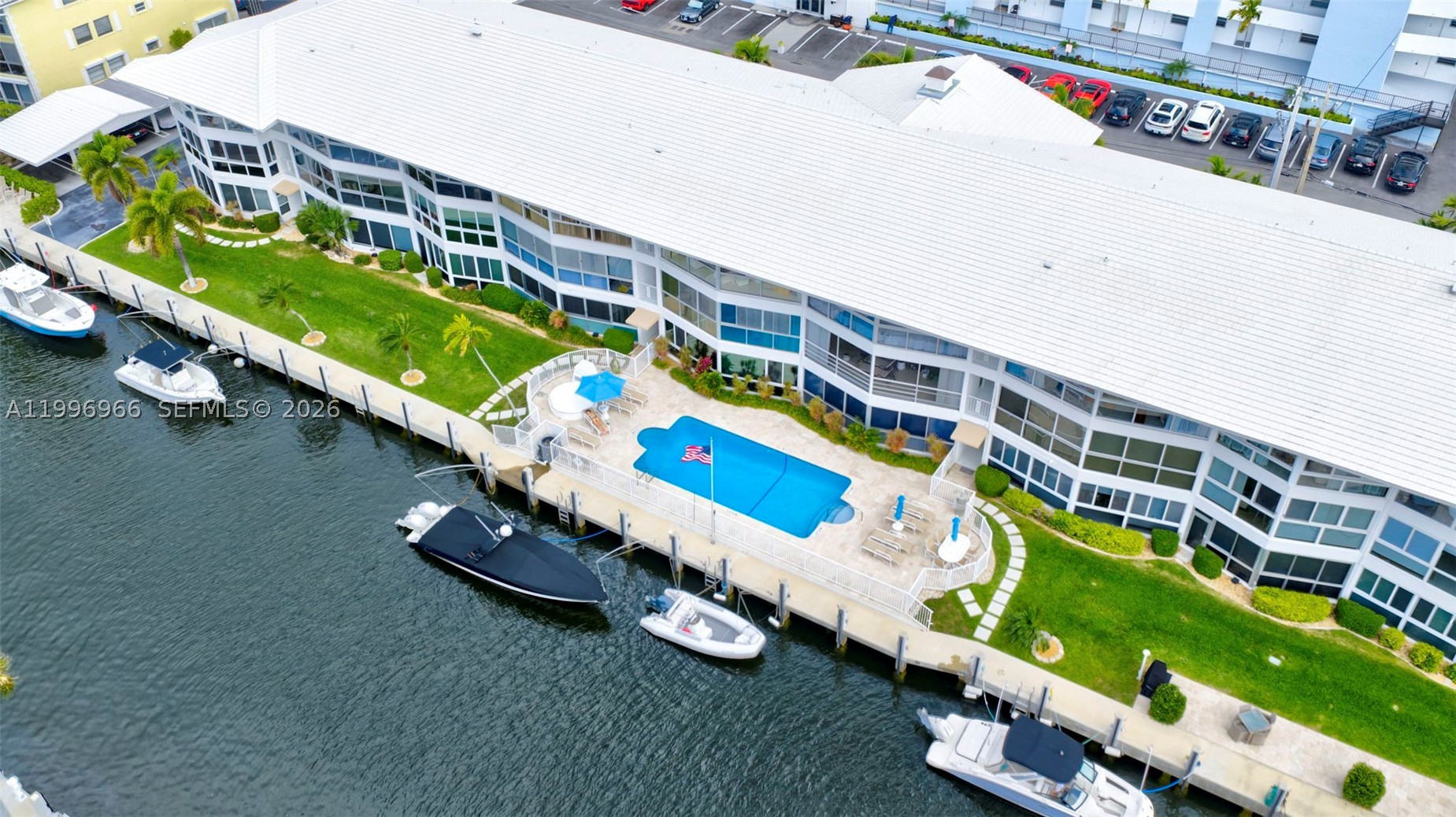 NO PENDING ASSSESSMENTS! 1648 LIVING SQ FT. SIRS COMPLETED! HEALTHY RESERVES! SELF MANAGED! HURRICANE IMPACT WINDOWS & DOORS. NEW SEAWALL. DOCK AVAILABLE FOR RENT – Only $150/Month (up to 38 ft boat). NO Fixed Bridges. Completely upgraded intracoastal-front 2-bedroom, 2-bath condo with an assigned covered carport, located just minutes from Lauderdale by the Sea vibrant nightlife, beaches, restaurants, and top entertainment destinations. This boutique 30-unit, self-managed community offers community pool, BBQ area, library, social room, extra storage, and Concrete restoration completed providing peace of mind for buyers. Property highlights include: open floor plan, corner unit with lots of windows providing an abundant of natural lighting creating a bright and airy atmosphere, enclosed lanai, contemporary faux wood accent panels and over $145,000 in upgrades including a fully updated kitchen and bathrooms, modern flooring throughout, custom closets, built-in surround sound system, smart stainless steel appliances, and a freshly painted interior. Corner unit with 80 feet of hurricane-impact windows wrapping around three sides of the unit. This is a rare opportunity to own a beautifully upgraded waterfront condo with boating access in a prime location.