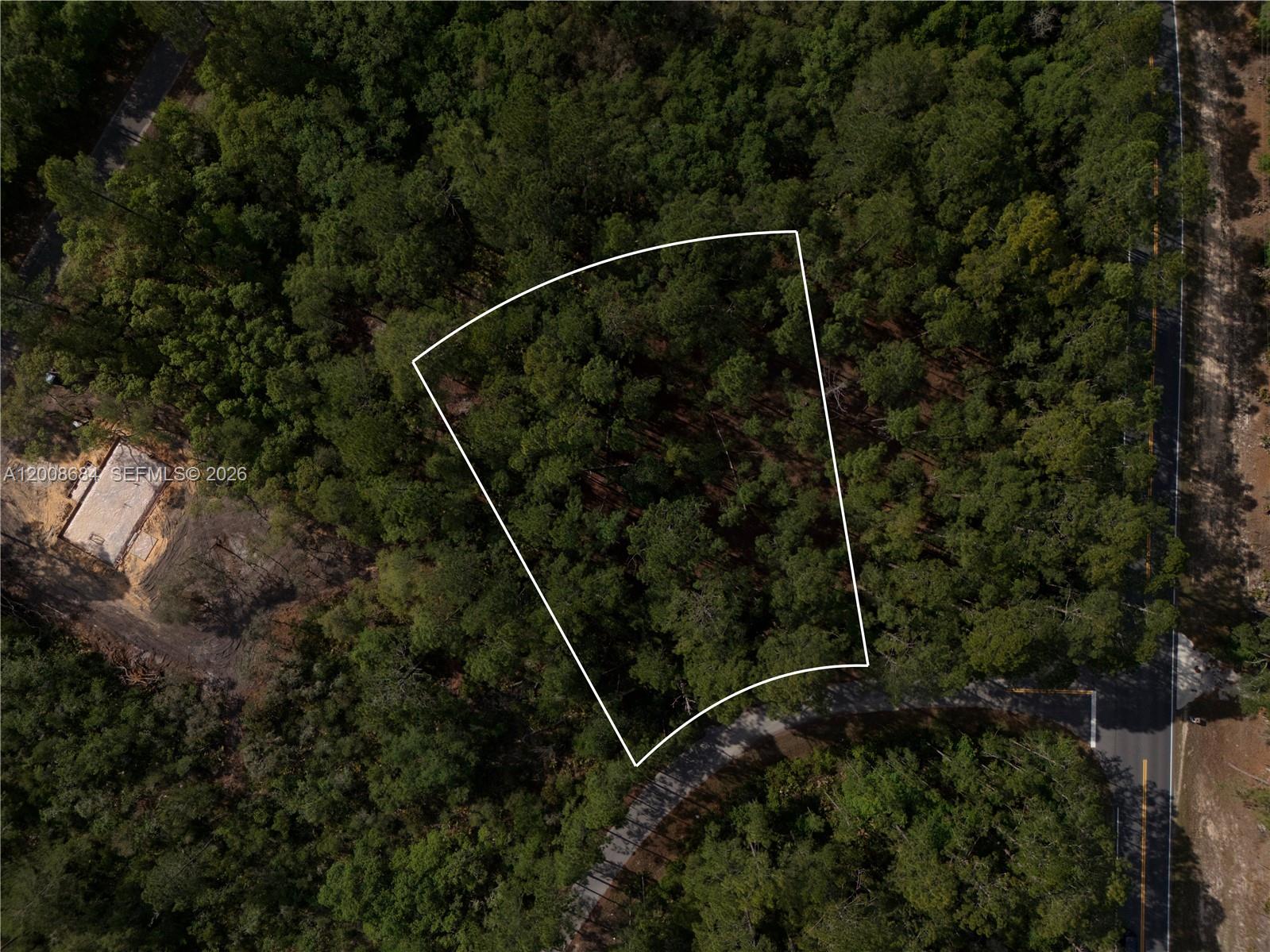 Build your dream home on this builder-ready corner lot located at 0 Fisher Trace Dr, Ocklawaha, FL 32179. This high-and-dry parcel offers an excellent homesite with nearby power and access via a paved street. The corner location provides added flexibility for design and access. Situated in a growing area with new construction, this lot is ideal for builders or buyers looking for a solid investment opportunity.