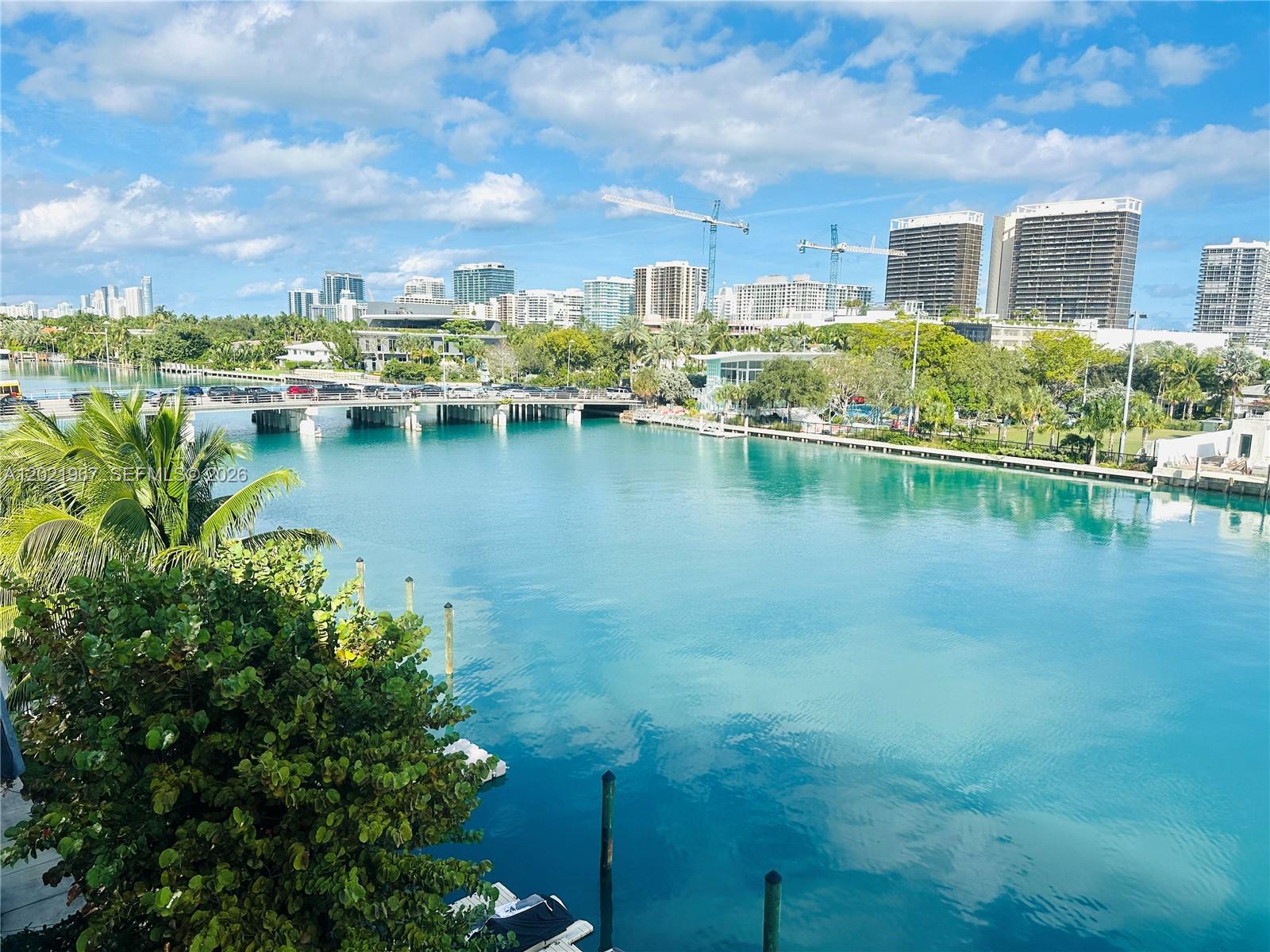 STUNNING WATERFRONT PH FLOOR UNIT WITH GORGEOUS STUNNING WATER VIEWS! SPACIOUS 2/2 BRIGHT IN BEST LOCATION, MINUTES TO BEACH, BAL HARBOR SHOPS, A+ ELEMENTARY SCHOOL, HOUSE OF WORSHIP AND MORE. EASY TO SHOW! NEW IMPACT WINDOWS! COMMON DOCK AVAILABLE FOR OWNERS!