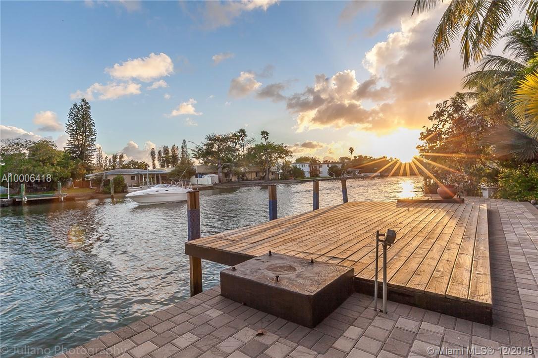 Amazing waterfront home in Normandy!  This home is completely remodeled and turn key ready.  Home is on a large canal with access to the bay and ocean.  Dock is in perfect conditions.  Kitchen, floors and baths all redone with amazing taste!  Contact us today for this 3 bedroom 2 bathroom home on the water! One of the rooms was used as an office and has glass French doors but can be easily converted back. 1 car garage with a circular drive way!  Plenty of space for cars to park.