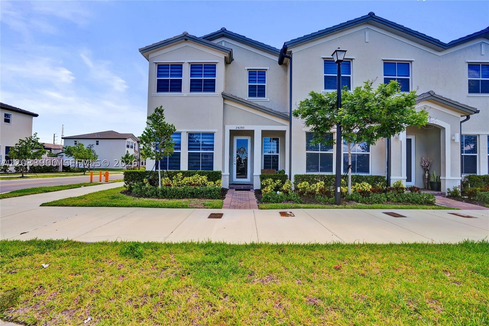 Stunning 4 bed 3 full bath corner unit-2024 new construction townhome in Avalon Square. Features Quartz counter-tops, tile floors, fenced in private yard, garage, luxurious zebra blinds, LED lighting and more.