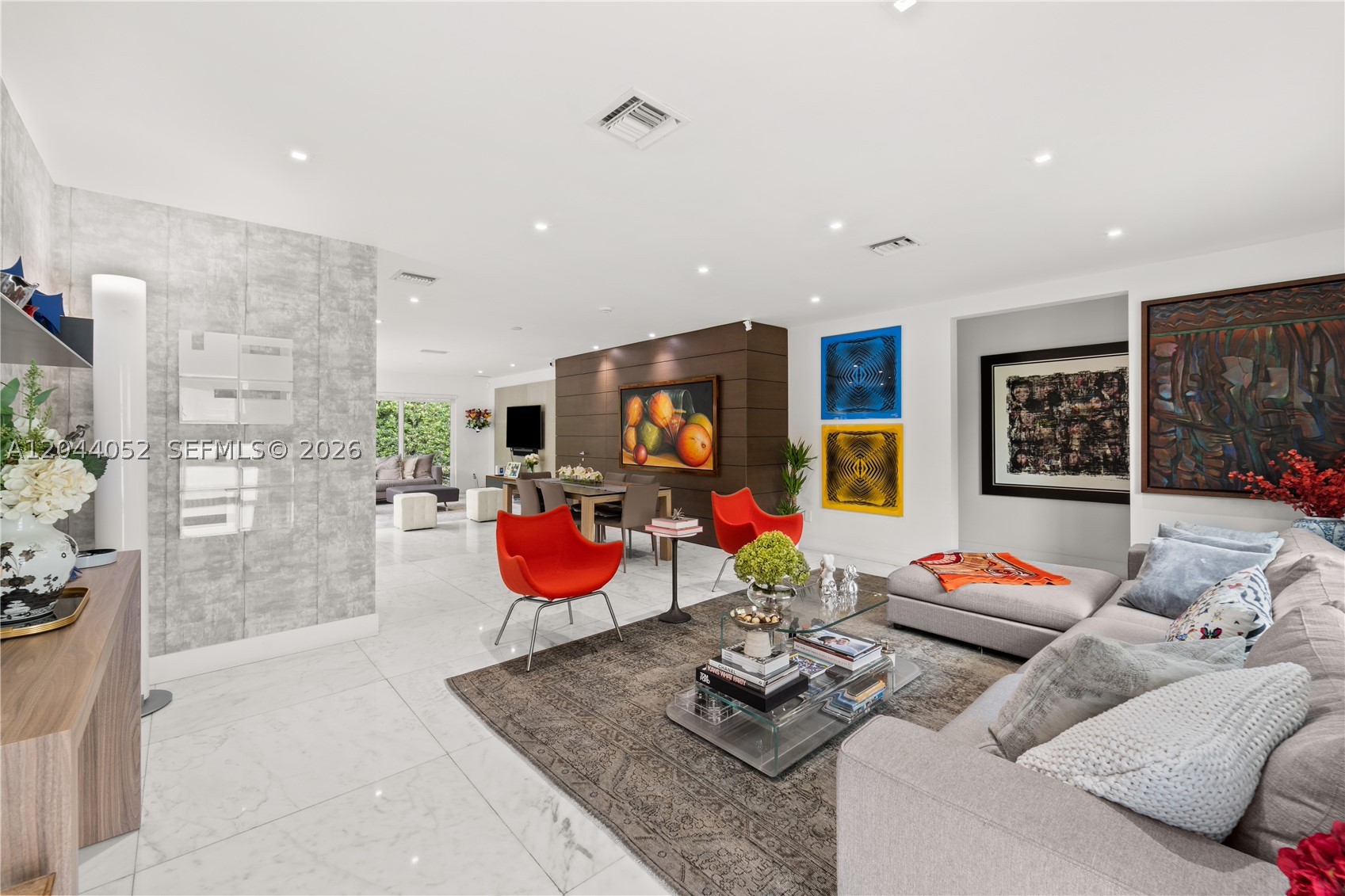 STUNNING totally renovated residence, in 2017. Features a bright and open floor plan. Lovely garden views from all rooms. Gorgeous 24 x 24 marble floors throughout the entire home. Modern kitchen with top of the line appliances and porcelain countertops. All bathrooms are tastefully updated. Impact windows and doors. Private fully fenced property, with large patio. Electronic metal gate. Large one car garage. Steps from Owen Waterway Park, Shops at Merrick Park and Coral Gables High School. Ready to move in !!! Real Seller !!! Won't last long !!!