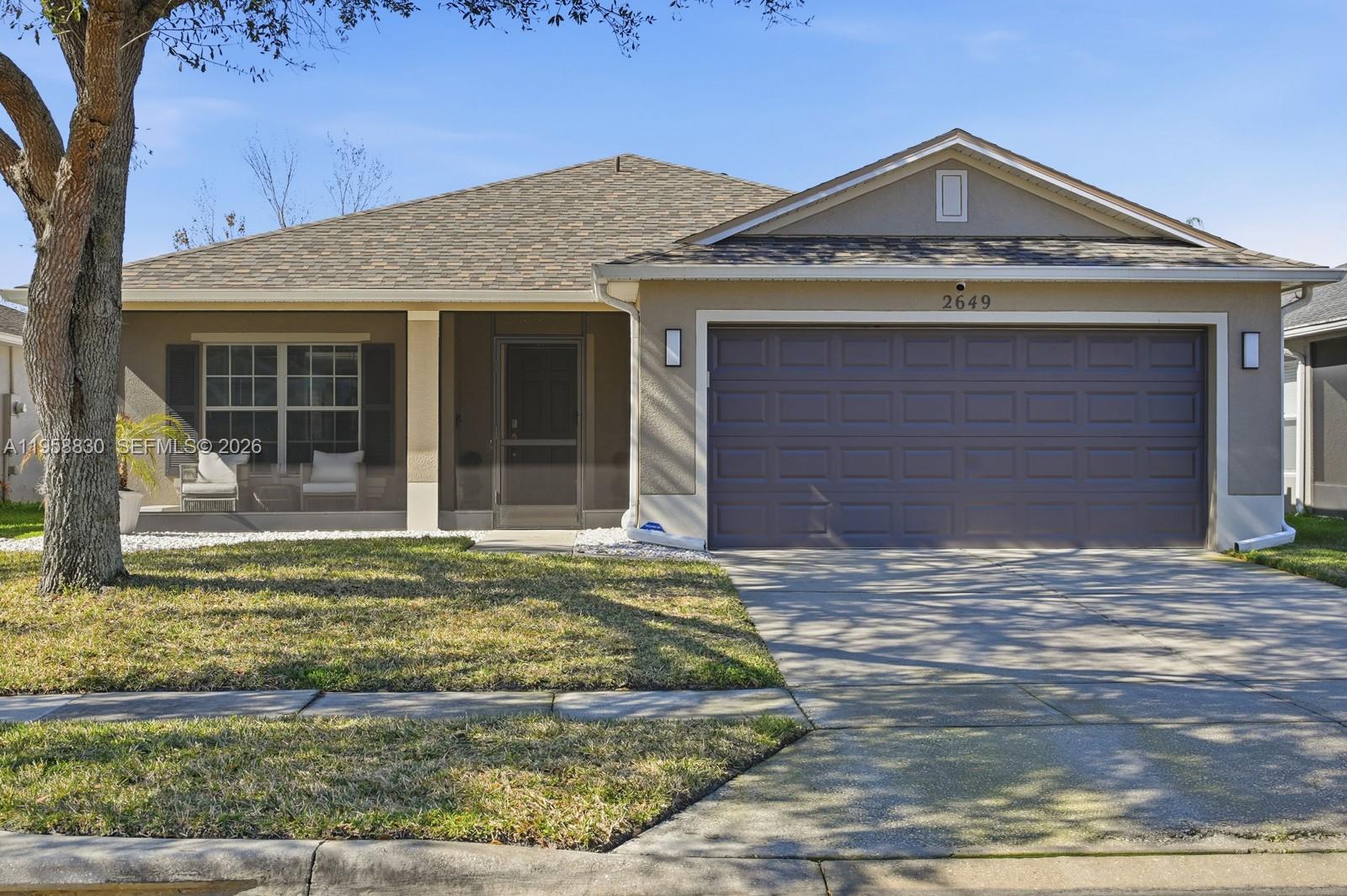 Welcome to this beautifully transformed Single-Family Home offering 3 Bedrooms/2 Bathrooms/2 Car Garage, where modern design meets everyday comfort. Completely remodeled from top to bottom, this home features an Open Concept layout ideal for entertaining and daily living. A newer Roof from 2025, Fresh Exterior Paint, and Stylish Light Fixtures provide peace of mind and instant curb appeal. Every detail has been thoughtfully updated, creating a truly MOVE IN READY experience. The heart of the home is the STUNNING, Fully Renovated Kitchen showcasing high-end stainless steel appliances, sleek quartz countertops, and a striking waterfall island that anchors the space. Both Bathrooms have been Completely Renovated with Upscale Finishes, including a spa-inspired primary bathroom with a Standalone Soaking Tub. All new upgraded flooring flows throughout the home, adding warmth, durability, and a cohesive modern feel. A Whole Home Water Filtration System adds an extra layer of comfort and quality. Enjoy Florida living with a Screened & Covered Front Porch, Newly Landscaped Front Yard, and a Fully Privacy Fenced Backyard featuring an Extended Patio & Gazebo, perfect for outdoor dining, pets, or relaxing evenings. Garage includes an Electric Car Charger for added convenience. Located in one of Central Florida’s most up-and-coming areas, this home offers exceptional value, style, and location. Schedule your private tour today and experience this incredible transformation for yourself!