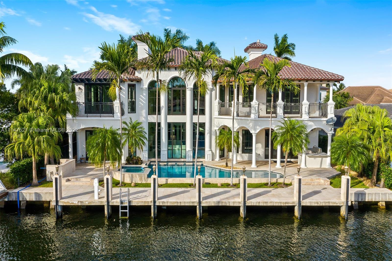 You will fall in love with this immaculate mediterranean inspired home. A rare 6-bed & 7.5-baths with 85ft deep waterfront/dockage available in the desirable The Landings Community. High ceilings, marble curving staircase, stone columns, marble floors, elevator, 3-car garage. Living room with fireplace over looking resort-style pool with jacuzzi. Master suite features a cozy fireplace sitting area, wet bar, expansive terrace overlooking the intracoastal. Remodeled entertaining equipped bar & Chef’s kitchen featuring gas cook-top, cooking island, top of the line appliances. Covered terrace and equipped summer kitchen/bar. Brand new roof, Impact Windows, A/C, and more. 
The Landings is close to best shops, restaurants, parks and top-rated schools - less than 2 miles from Pine Crest.