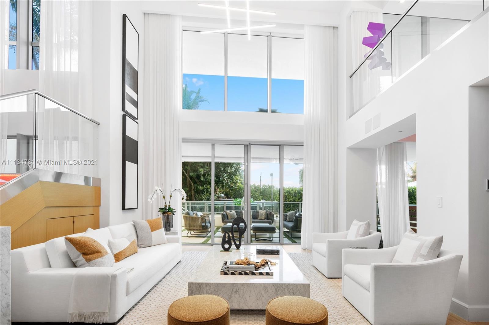 This one of a kind two-story duplex boasts 4 bedrooms, 4.5 bathrooms, 2 sunrise terraces, 1 sunset terrace, a glass-encased wine vault enclosing your private home office and is located in the ultra exclusive building Ocean House. The Beach House is the only place that provides the comfort and privacy of a single family home with the world class amenities and premier security of the highest end building that Miami has to offer. Your high-tech entertainment pad is just steps away from the beach and pool with resort style services, high-end shopping and fine dining restaurants.