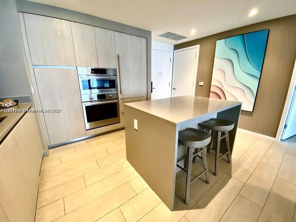 2 bedroom 2 bath condo hotel with amazing ocean views from all rooms and large balcony and flexible rental options this spacious and bright unit with all included tasteful furniture and appliances makes for a desirable investment property and vacation home. Proximity to airports and highways gives it desired easy access.