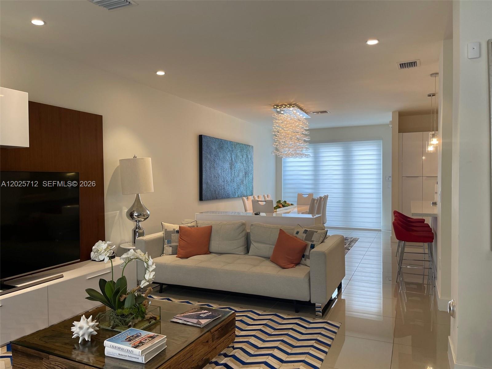 Rented until June 15 2027.Beautiful 2 level townhome at Landmark, fully furnished with high quality furnishings and carefully decorated, waiting for someone to call it home. This home includes Vivant Smart Home & Security System, Doorbell Camera, Custom California Closets, New Custom Hardwood Flooring, 4 Modern Chandeliers, Washer & Dryer, Club House with Full Gym, Pool, & BBQ, and plenty of guest parking.