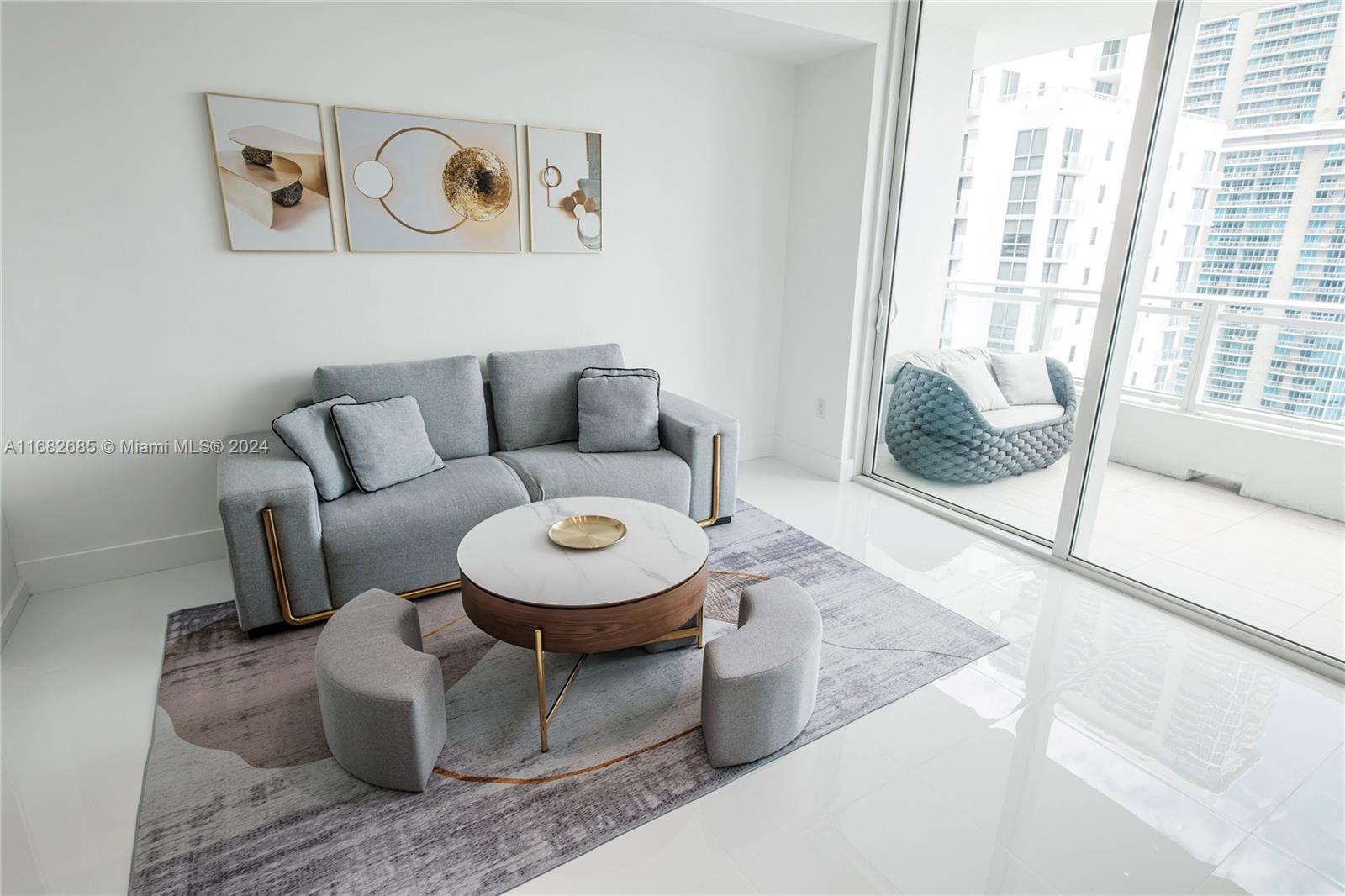 One of the best line in the building with OPEN PANORAMIC VIEW of the Brickell bay from the 39th floor. Designer decorated 1 bedroom plus den with a custommade murphy bed , 1 and half bathroom, large full kitchen, walk in closet, combined washer/dryer. 1 parking space on the 3rd floor. The apartment is equipped with motorized blinds and shades with remote control. The building offers 24/7 security, valet, resort style swimming pool, hot tube, sauna, gym, games and conference room, library, kids room. Great location in the heart of Brickell , Metro rail/Metro-mover station , Restaurants and Brickell City Center are just around the corner. Starbucks is in the building. Rental insurance policy required.