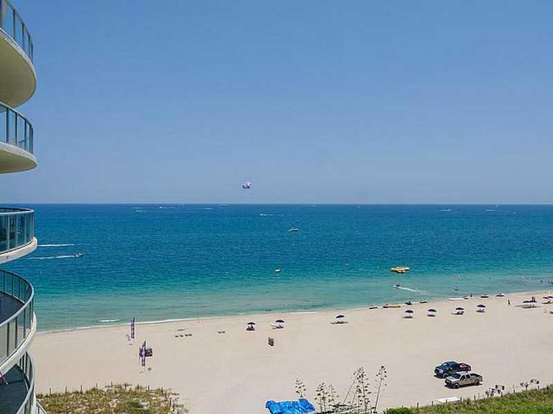 Stunning 3 bed 3.5 bath oceanfront apt at the Coconut Grove Residences. This unit has magnificent direct panoramic ocean  views, large private terraces and a spacious floor plan. This is the largest 3 bed floor plan in the building with travertine floorin g,  granite counter tops and top of the line appliances. This apt has barely been lived in so it's like buying a brand new unit. This  luxury boutique building offers a deeded private beach, infinity heated pool, cabanas, gym, valet, 24 hrs. security.