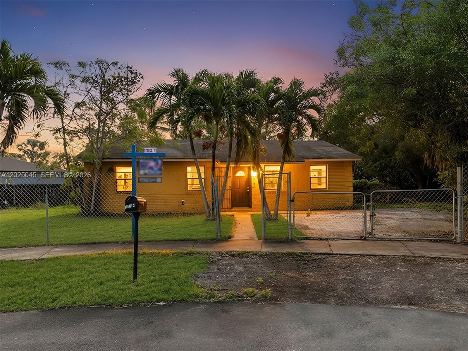 Located in the desirable Avocado Villas community, this 4BD/2BA home sits on a huge 9,729 sq ft lot with endless possibilities. Inside, you’ll find generous living spaces, a functional kitchen, dedicated laundry room, and a private primary suite. The oversized fenced yard offers plenty of room for a pool, boat, RV, or future outdoor entertaining area. A storage shed adds extra utility. Ideal for homeowners or investors looking to add value. Prime location near Krome Ave, US-1, the Turnpike, and just a short drive to the Florida Keys. NO HOA! Virtual 3D tour available. May your Best start here!
