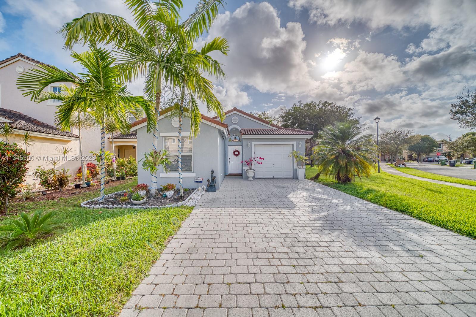 Beautiful Corner Single family home located in the peaceful community of Shores at Keys Gate. This 3 bedroom 2 full bathroom has a one car garage.  Updated kitchen cabinets with brand new stainless steel appliances  Tile floors through all the house, lovingly maintained and back yard paradise are just a few the features of this house.  All offers considered. Showings start on February 25.