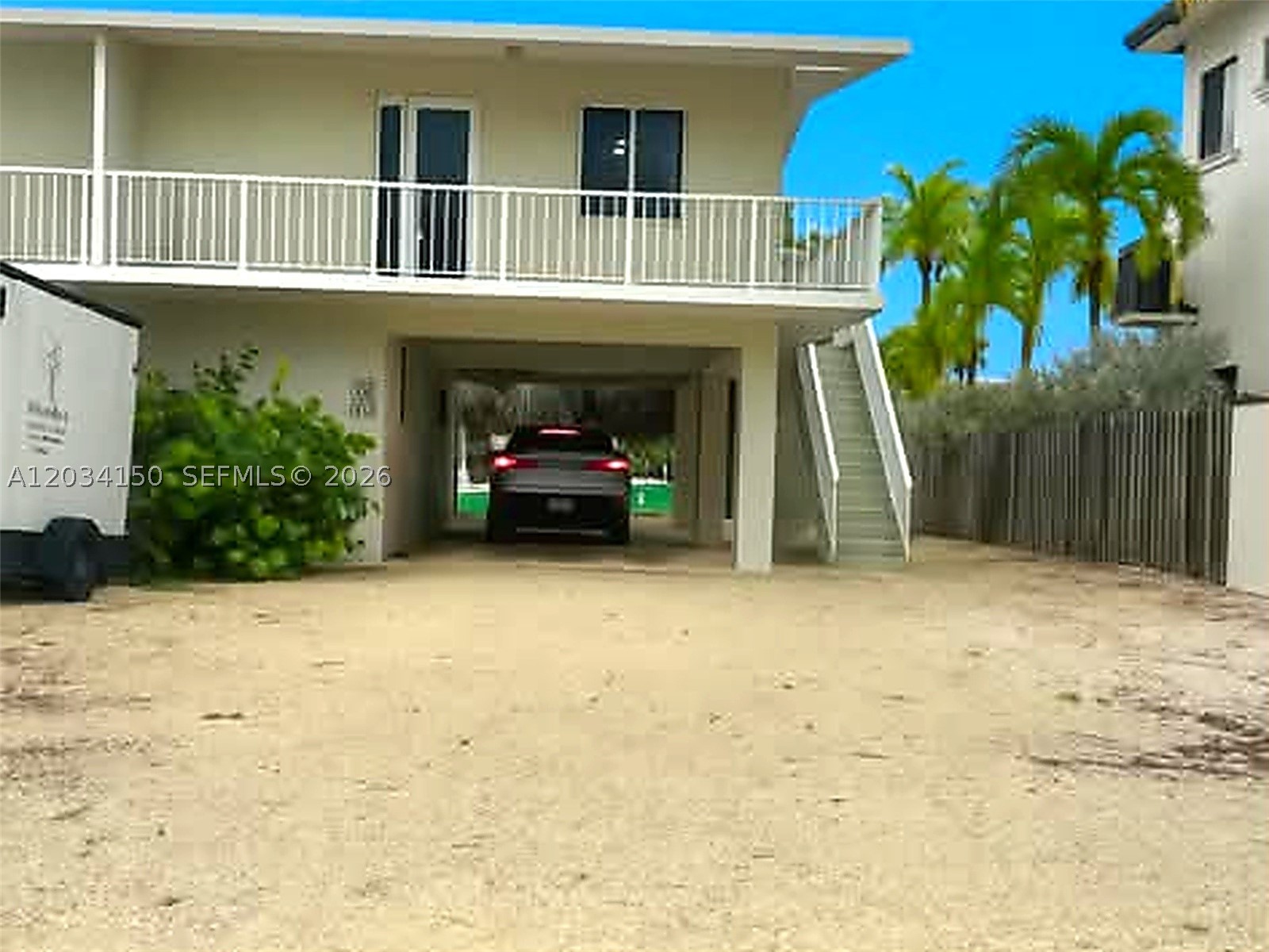 Waterfront 2-Bedroom Getaway in Port Largo! This remodeled home is filled with natural lighting and showcases an
open layout, modern kitchen with stainless steel appliances, in-unit laundry, covered parking, and a 12,000 lb boat
lift. Big storage room on the first floor.  Enjoy the Keys lifestyle with a tiki hut, fish-cleaning station, tropical landscaping, and exclusive community
boat ramp access—just minutes from parks, dining, and all that Key Largo has to offer.