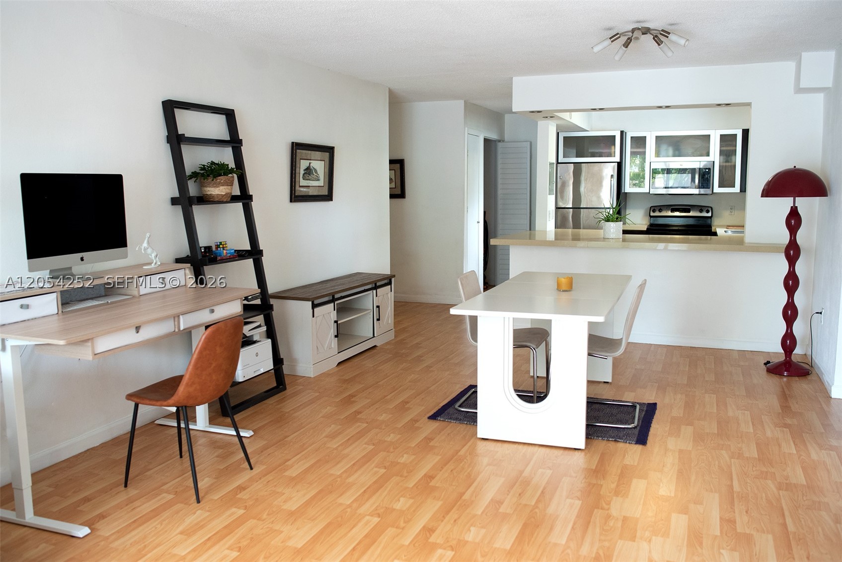 Welcome home to this spacious and very well-maintained 1-bedroom, 1.5-bathroom corner residence in the heart of South Beach. The generous floor plan offers comfortable living with a remodeled kitchen featuring stainless steel appliances, a nicely sized private balcony, and plenty of closet space throughout. A versatile space off the kitchen can be used as a pantry, utility room, or additional storage. The half bathroom is a valuable feature, providing added convenience for everyday living and when guests visit. The unit comes with an assigned parking space in a gated parking area, and there is a laundry room on every floor. Ideally located near Flamingo Park, Whole Foods Market, shopping, dining, and the beach, this home offers the best of South Beach living.