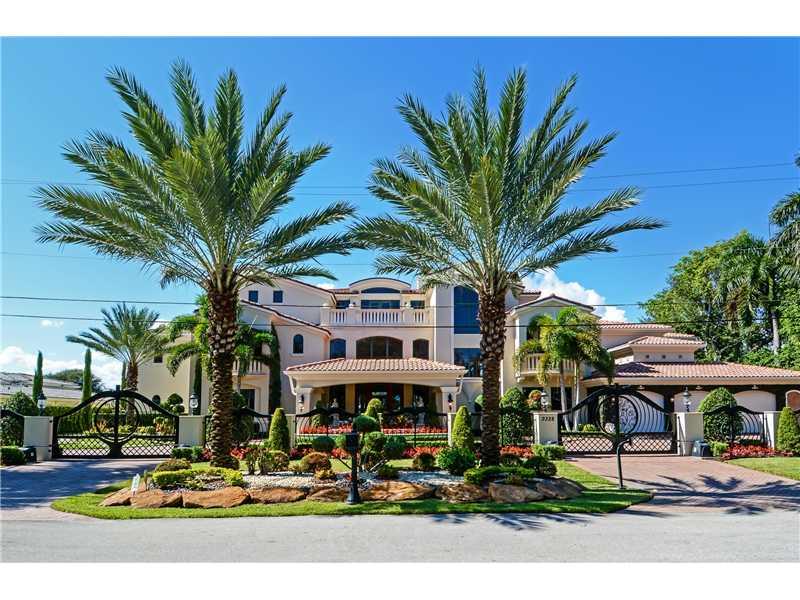 This 3-story Mediterranean inspired estate is the perfect blend of elegance & sophistication, while combining the best of indoor & outdoor living. Offering just over 10,000 square feet of living space, 8 bedrooms, 11 full bathrooms & 2 half baths. Boastin g 150 feet of prime water frontage, easy ocean access and a private concrete dock for a true mega yacht, this home offers the best in waterfront living. Additional features include: theatre, game room, full bar, elevator, pool with built-in-bar and spa.