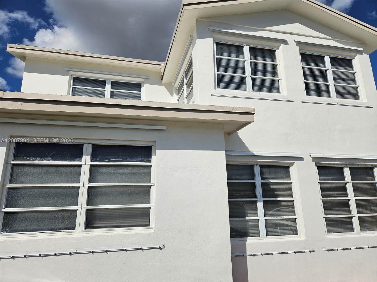 Available for showings after Monday May 11th. Savy Investors understand the value of location in an OPPORTUNITY ZONE plus a positive NOI. Located down the street from Versailles Restaurant, a few blocks from Coral Gables, Tamiami Trail (8 Street) and Flagler St. This 2 story duplex valued as a fourplex featuring 2 units, top and bottom, plus a grandfaher-in separate building structure in the back that has two separate apartments. A rare find that it is a must see to appreciate. Long term tenants who up-keep the units in great condition. Top unit was remodeled throughout. All units have central a/c and separate meters. Coin washer and dryer in a common area for tenants to use. 24 HOURS SHOWING NOTICE REQUIRED.