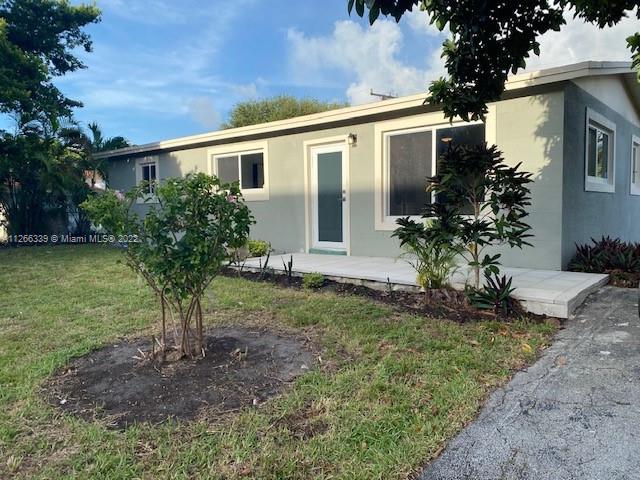 Fully Renovated home in a the highly desired area of Ives Estates, Watch your children walk to school from your front porch. Large fenced yard with a screened back patio perfectly positioned for a pool. New Kitchen with white Shaker cabinets complimented with white quartz countertops. Top of the line appliances. front loader washer & dryer. New electric and plumbing. New Carrier HVAC system. Impact windows and doors. Home is tastefully done with grey and white and the popular new grey vinyl flooring. Bathrooms have grey porcelain tile with a shower in one and a tub in the other. The home has Instant hot gas water heater to save electric.