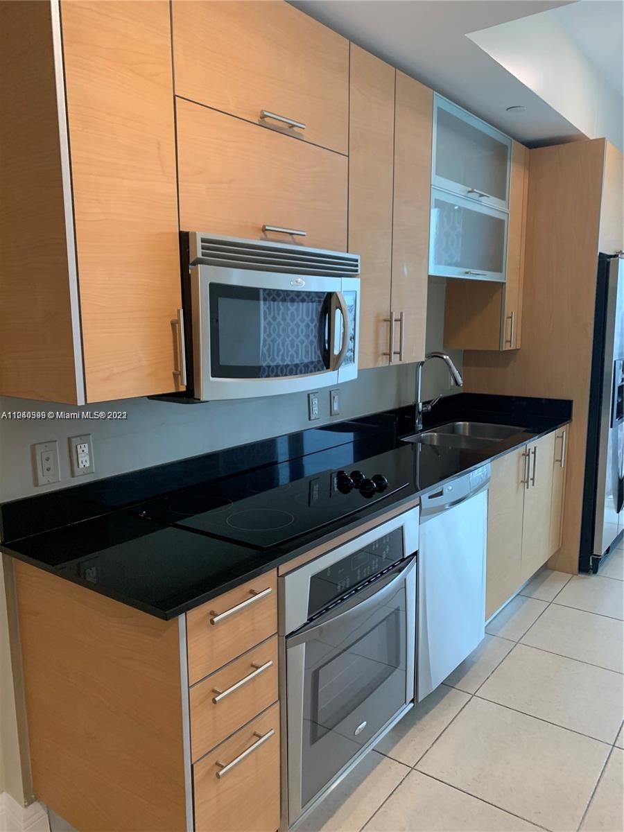 INFINITY AT BRICKELL COND - Residential Lease