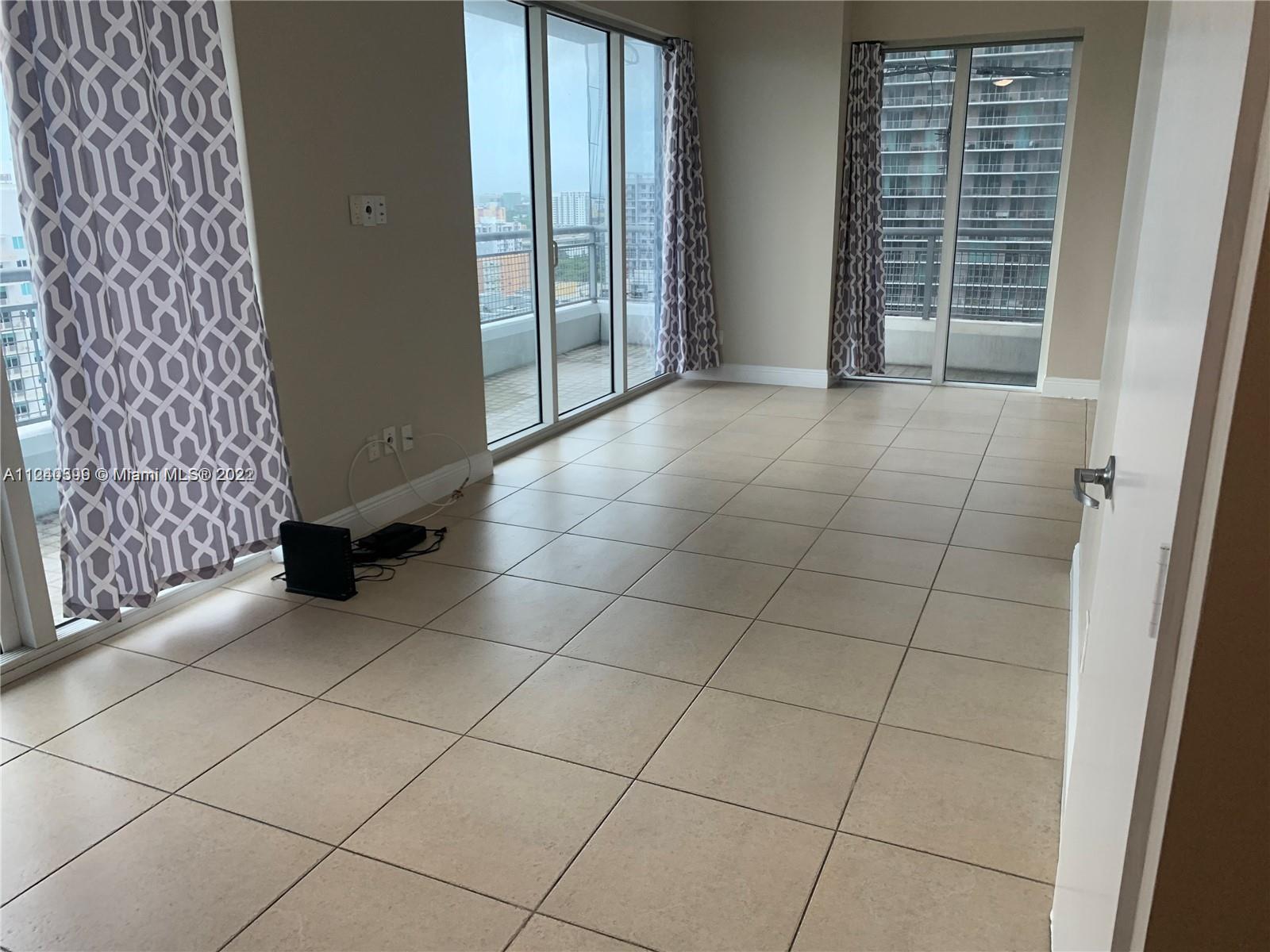 INFINITY AT BRICKELL COND - Residential Lease