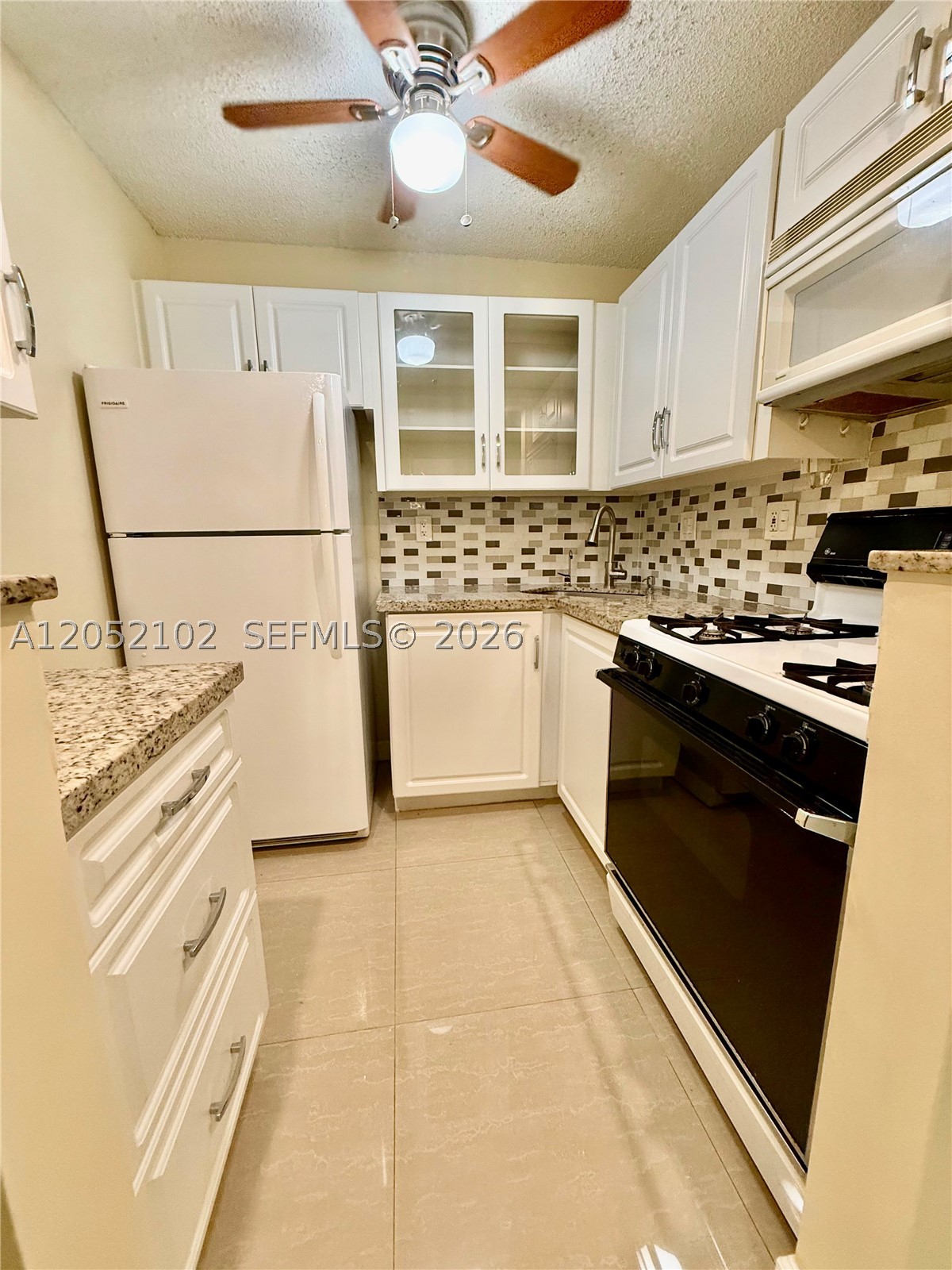 Move-in-ready first-floor 1-bedroom garden apartment in a well-maintained 55+ community! Features an updated kitchen and bathroom, brand-new stove, ceramic tile floors, spacious bedroom, and a relaxing screened patio. Enjoy community amenities including a pool, gym, sauna, and clubhouse. Conveniently located near shopping, dining, transportation, and major highways. Easy to show—schedule your appointment today!